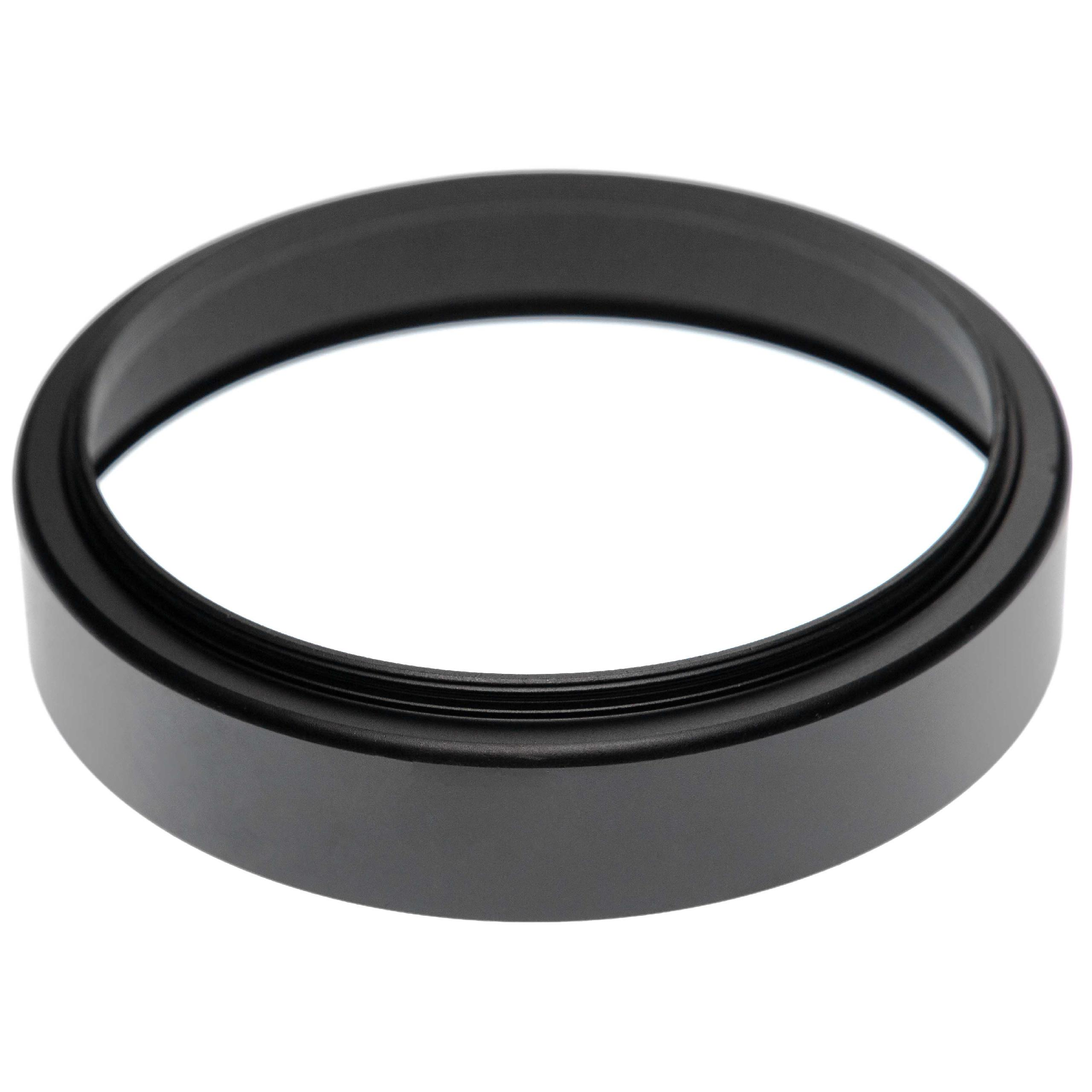 Ein schwarzes ringförmiges Objekt mit weißem Innenraum ist auf weißem Hintergrund isoliert. Der Ring hat eine matte Oberfläche.