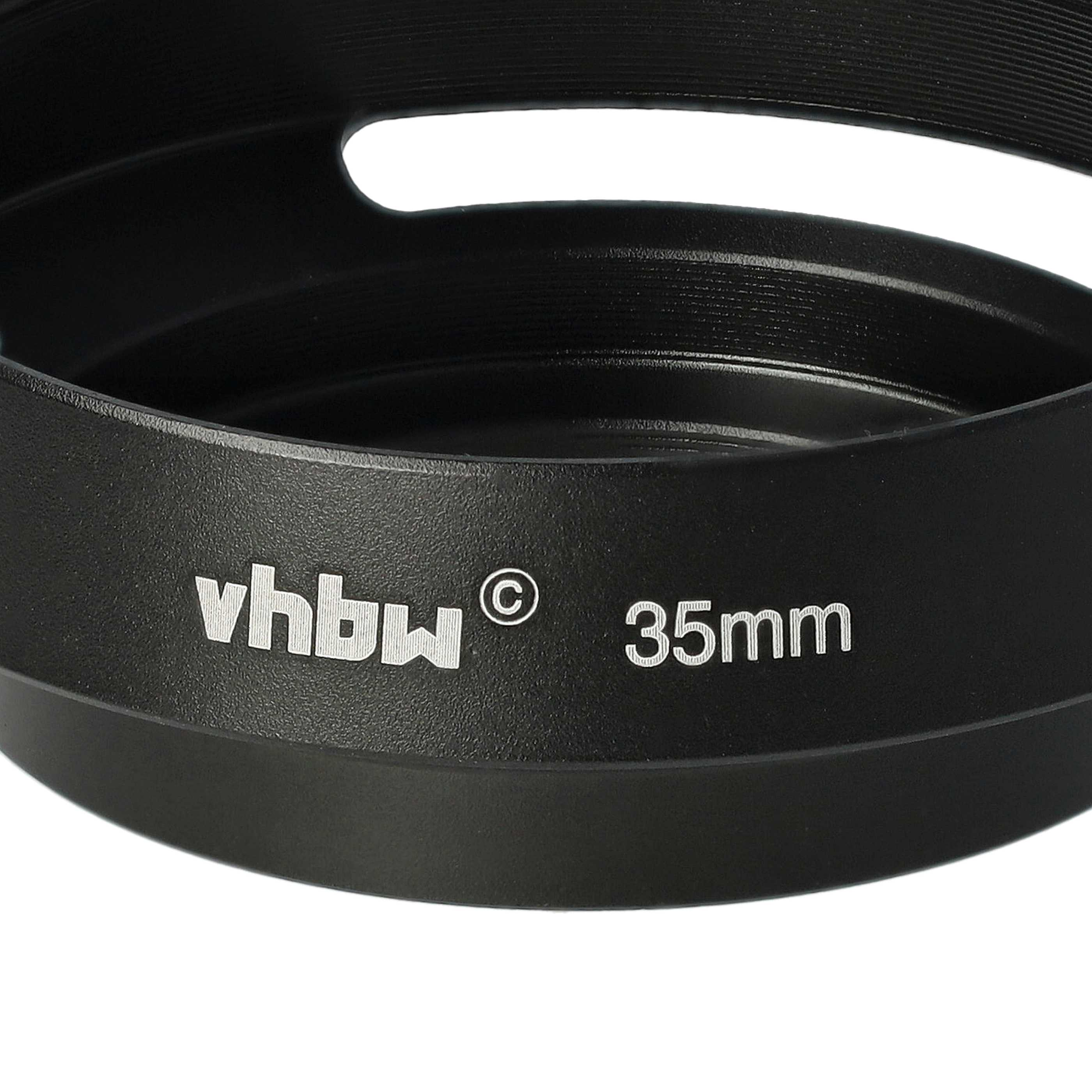 Eine schwarze Sonnenblende mit weißem Text mit der Aufschrift 'vhbw 35mm'.