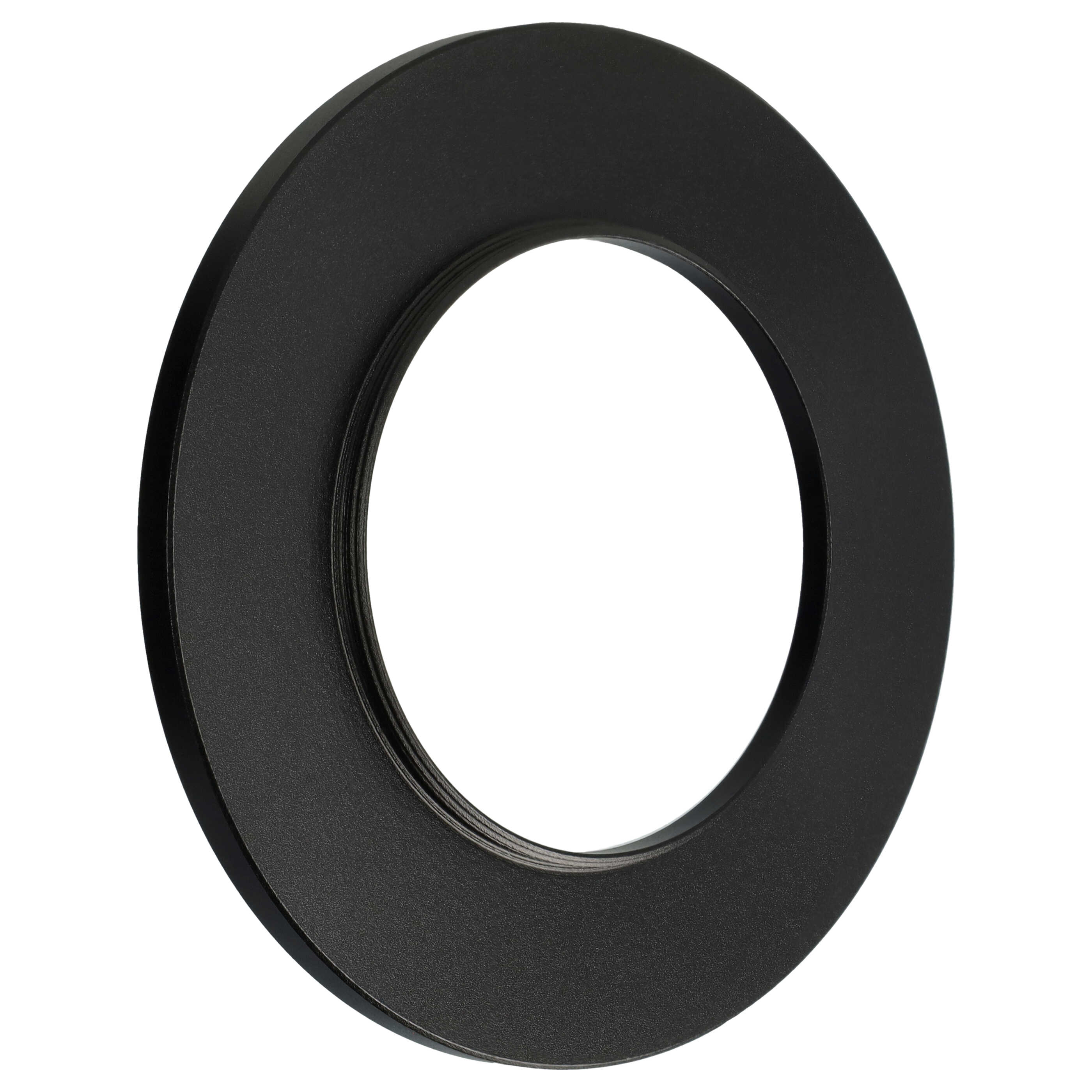 Ein schwarzes kreisförmiges Objekt mit einem Loch in der Mitte befindet sich auf weißem Hintergrund.
