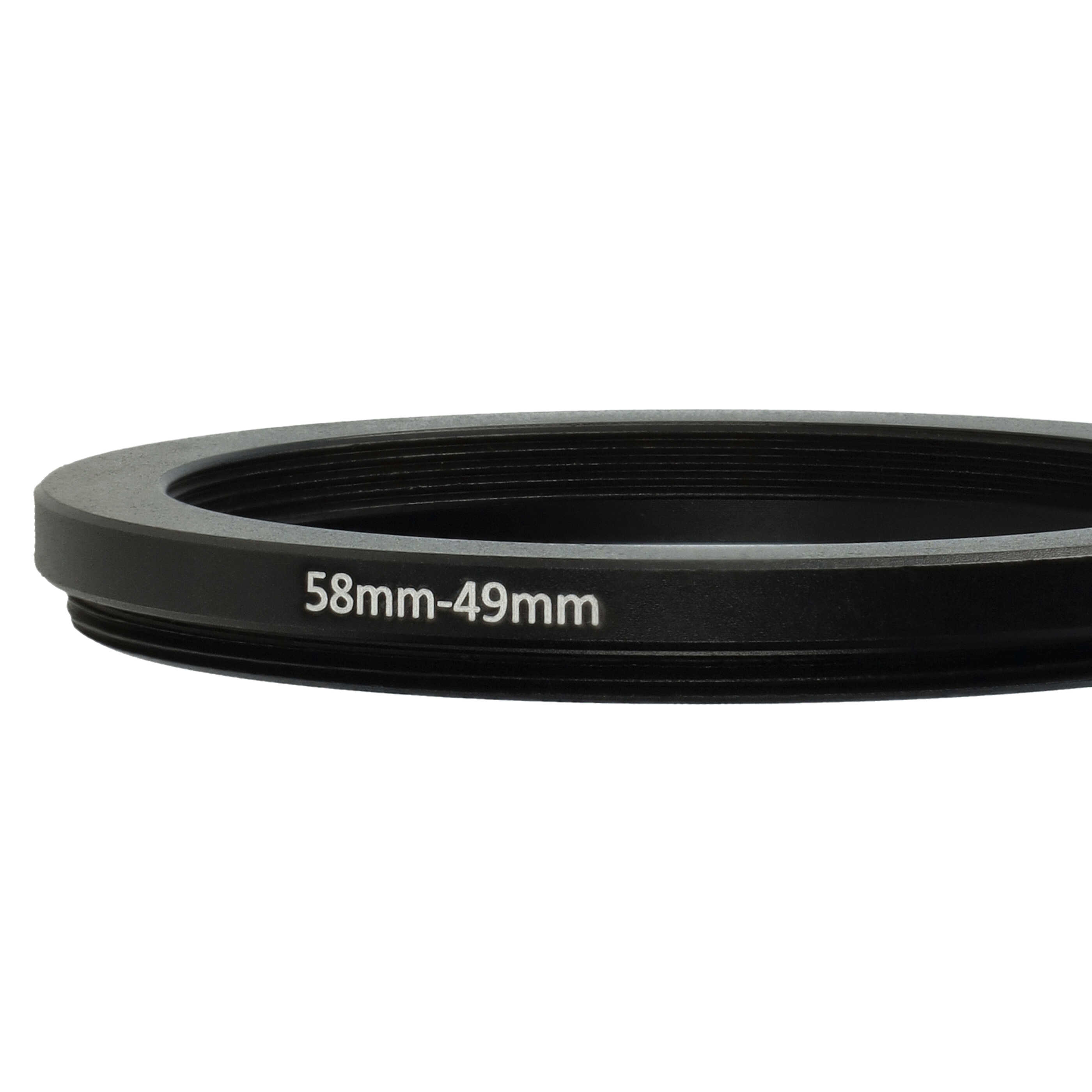 Ein schwarzer Objektivadapterring mit weißem Text: 58mm-49mm. Der Ring ist kreisförmig und liegt vor einem weißen Hintergrund.