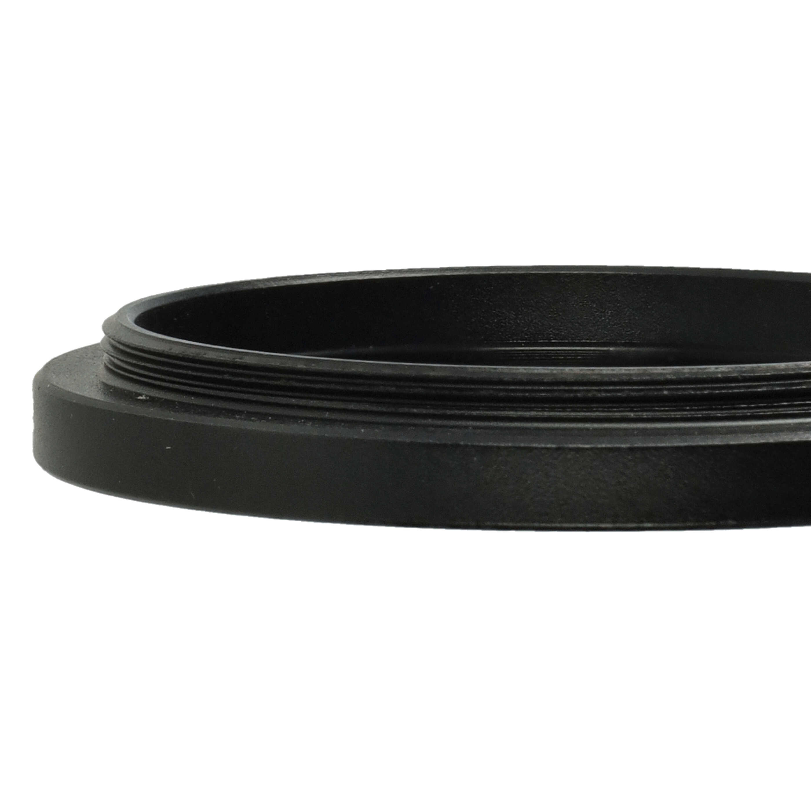Nahaufnahme eines schwarzen Metallrings mit Gewinde auf weißem Hintergrund. Der Ring hat eine strukturierte Oberfläche.