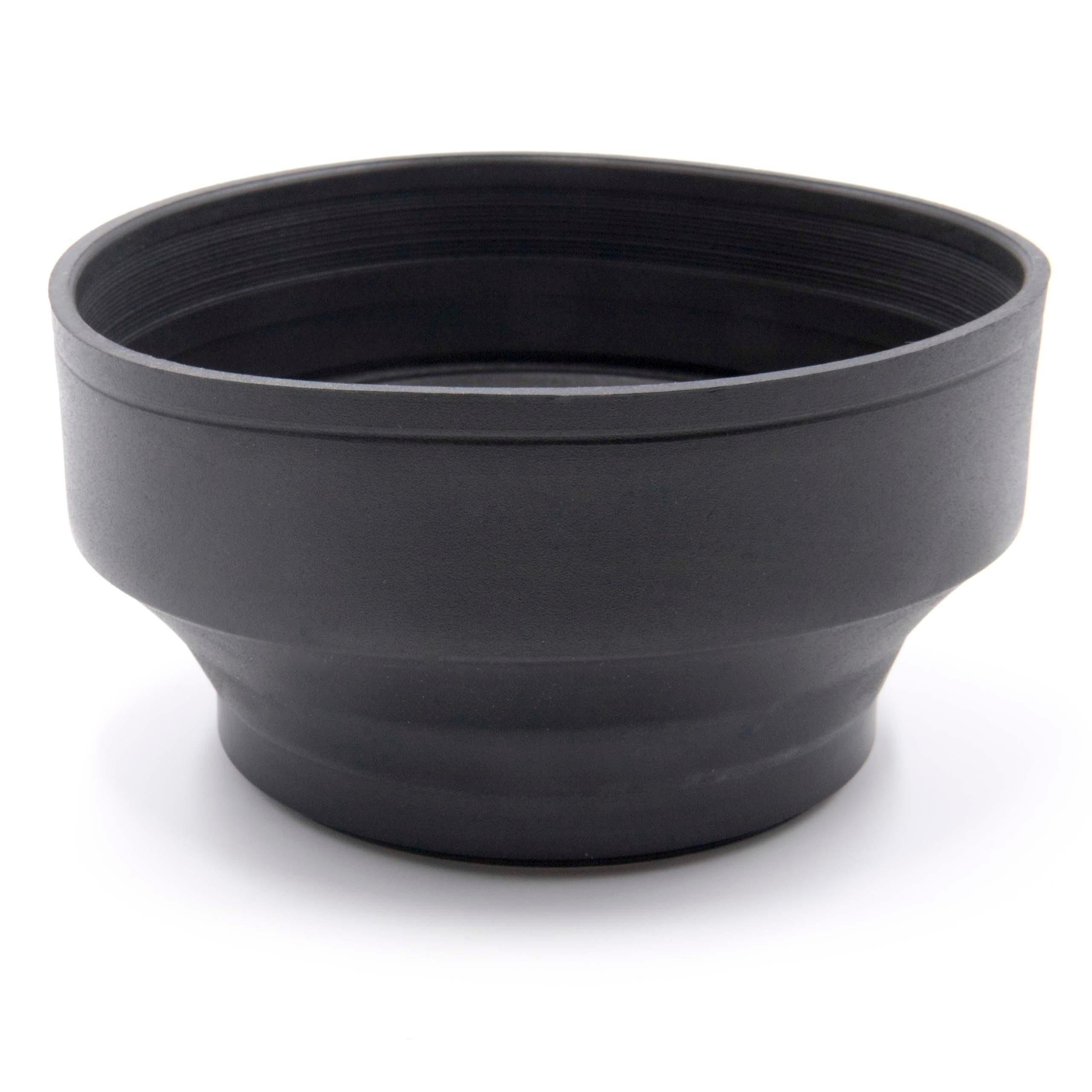 Eine schwarze Sonnenblende liegt auf einer weißen Oberfläche. Sie hat eine breite, zylindrische Form mit breitem Sockel.