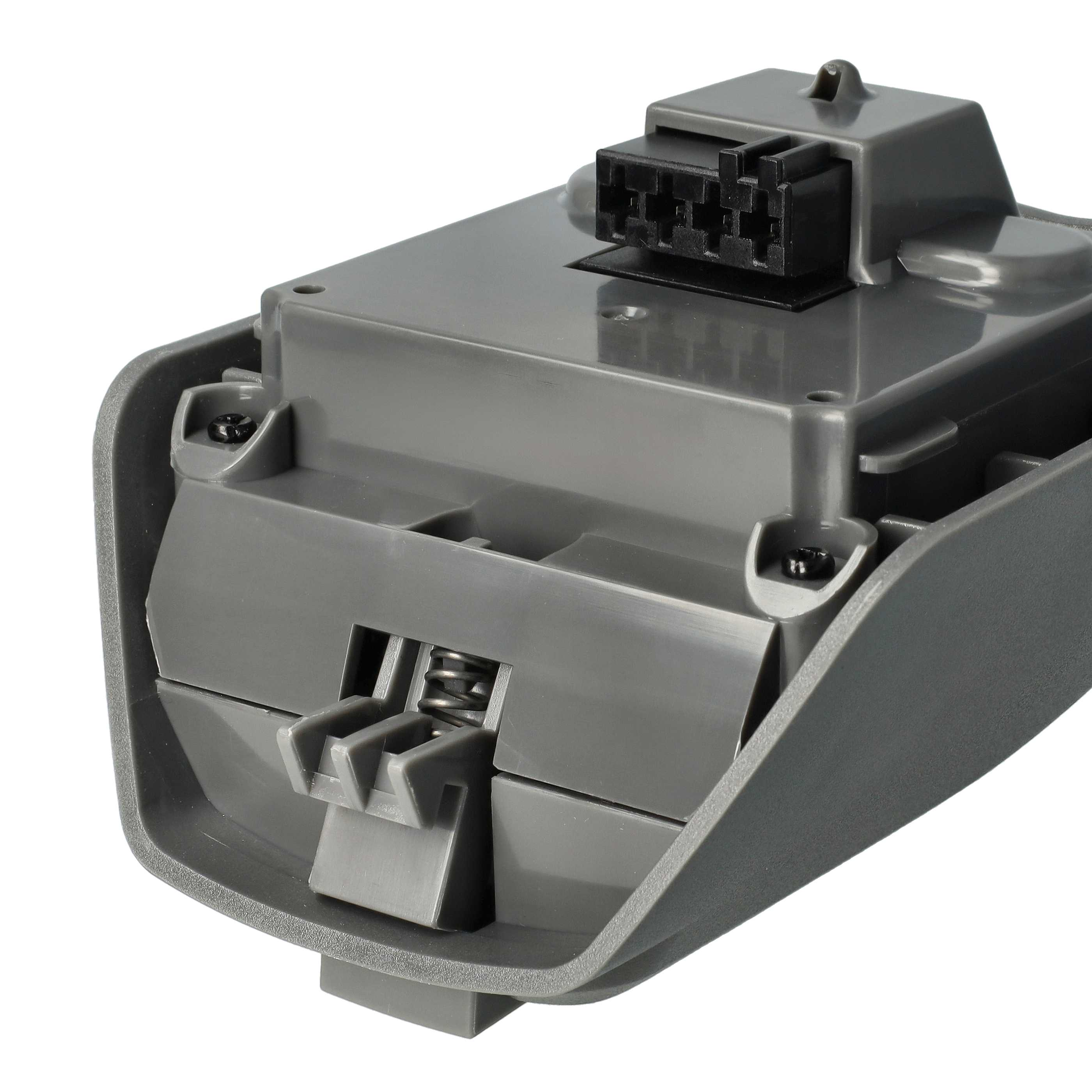 Graues Kunststoff-Autoteil mit schwarzem Stecker oben, einer Feder und Befestigungsmerkmalen. Isoliert auf Weiß.