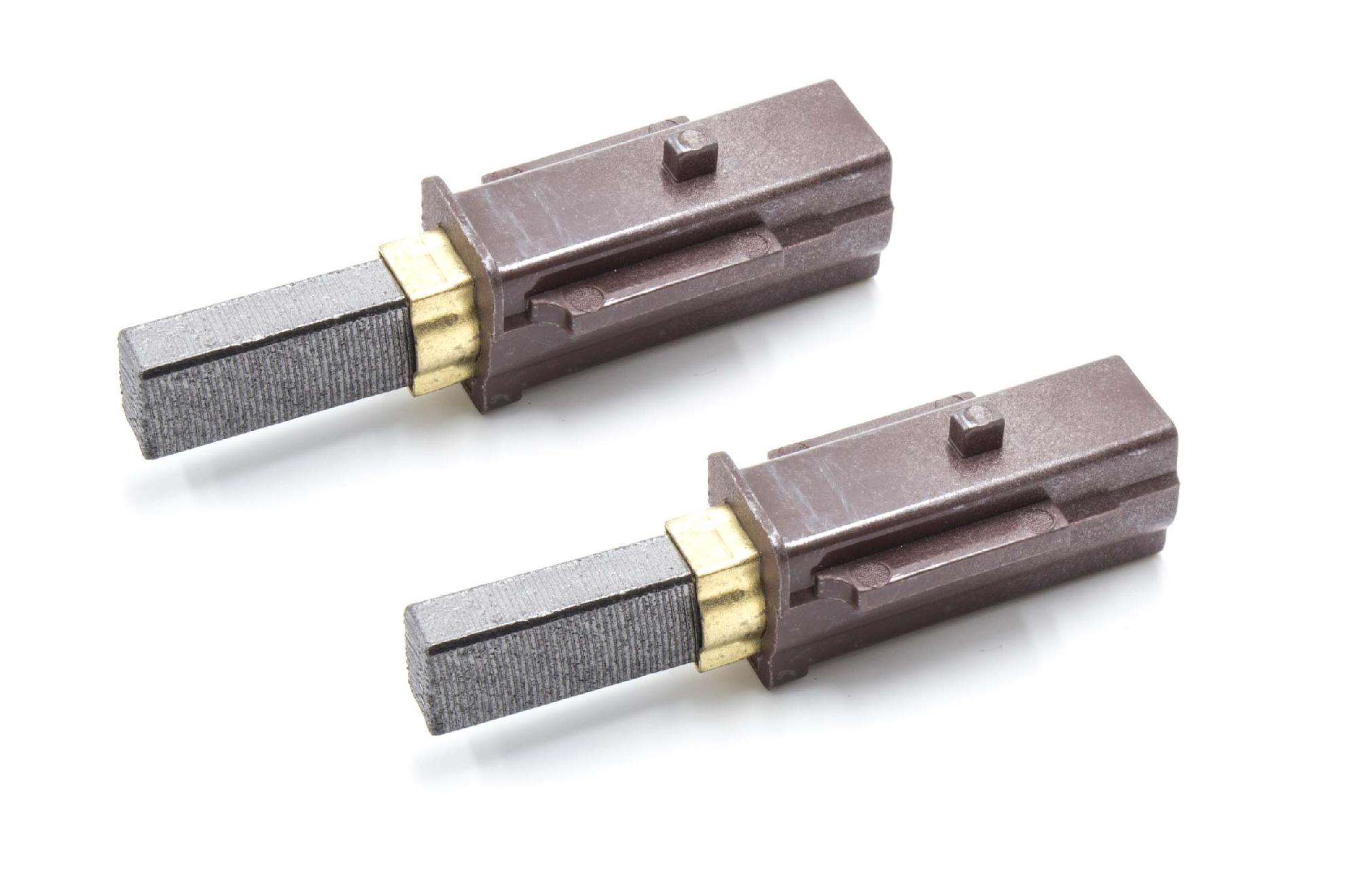 Zwei Motorbürsten auf weißem Hintergrund. Jede hat einen grauen Kohleblock, einen goldenen Stecker und ein braunes Kunststoffgehäuse.
