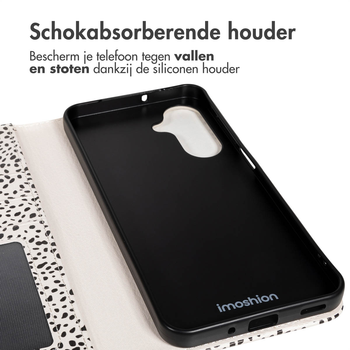 Zwarte telefoonhoes, open, met imoshion-logo. De hoes ligt op een gespikkelde witte ondergrond. Boven staat 'Schokabsorberende houder'.