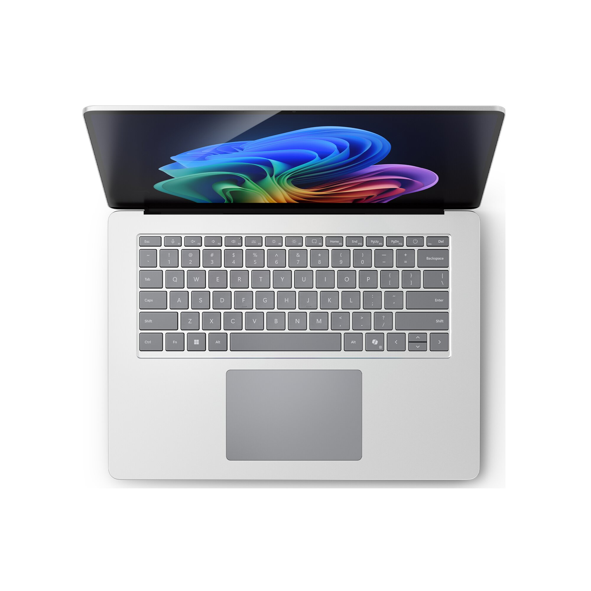 Laptop aperto, mostra tastiera e schermo colorato. La tastiera è argentata con tasti scuri.