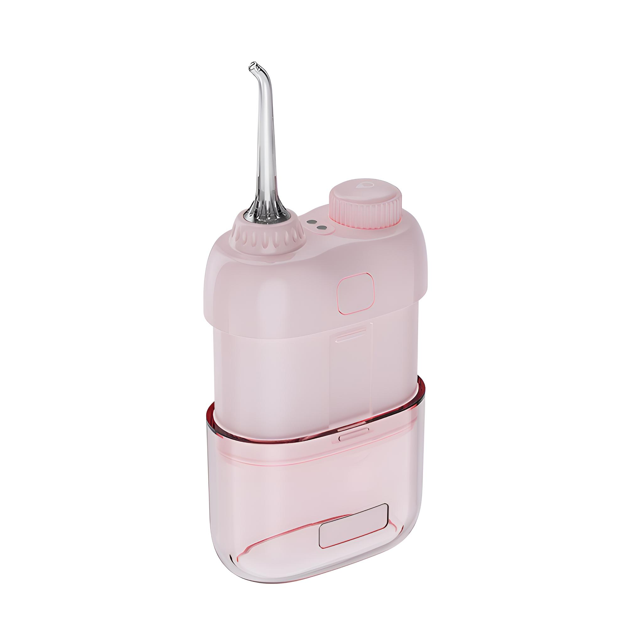 Ein rosa und klarer Wasserflosser. Er hat eine silberne Düse und einen transparenten Wasserbehälter.