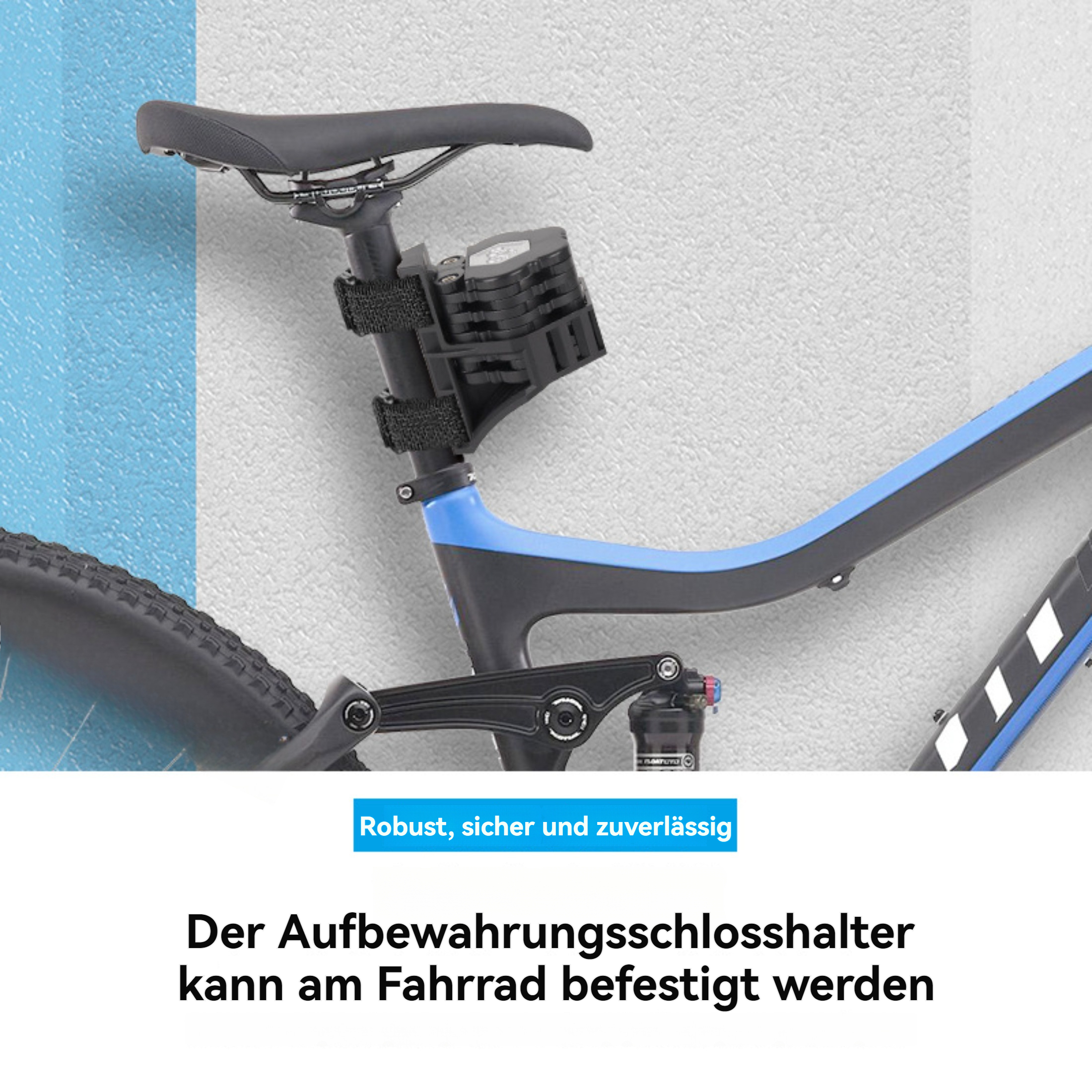 Ein schwarz-blaues Mountainbike mit einem Schloss-Halter unter dem Sitz. Der Hintergrund ist hellgrau.