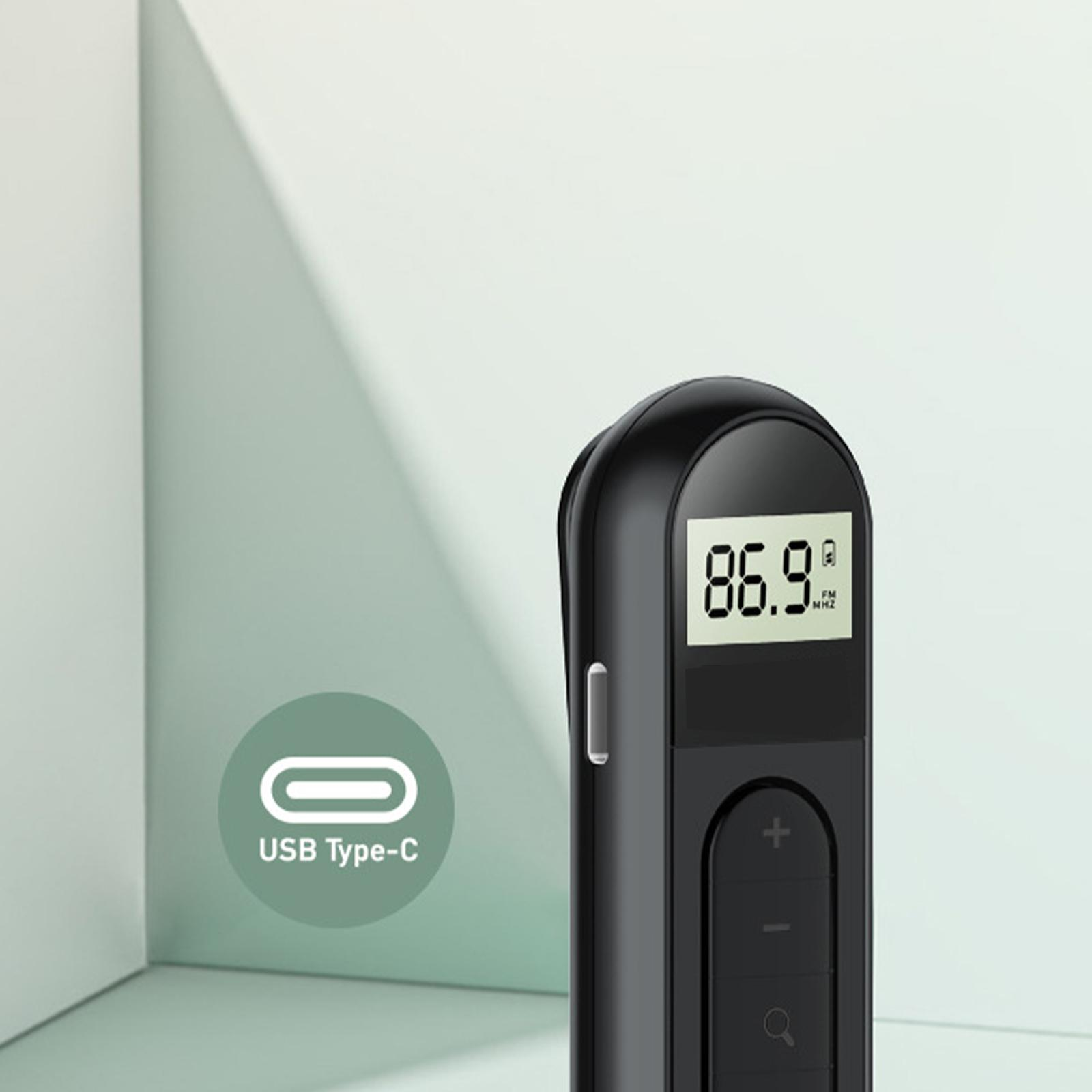 Schwarzes Gerät mit Bildschirm, der 86,9 MHz anzeigt. Hat USB Typ-C Symbol und Knöpfe. Hintergrund hellgrün.