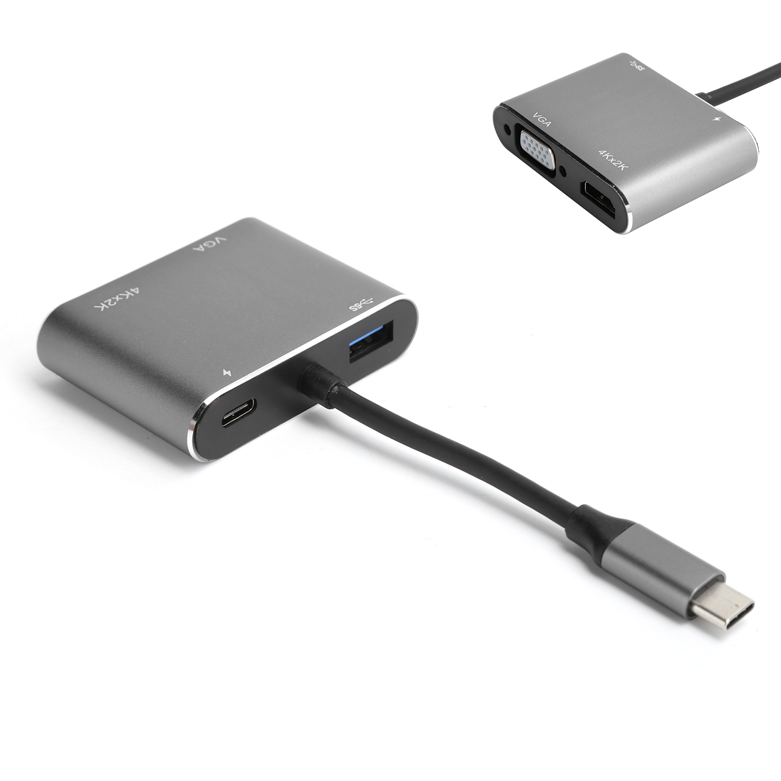 Ein grauer USB-C-Hub-Adapter mit VGA-, HDMI- und USB-Anschlüssen. Ein schwarzes Kabel erstreckt sich vom Adapter.