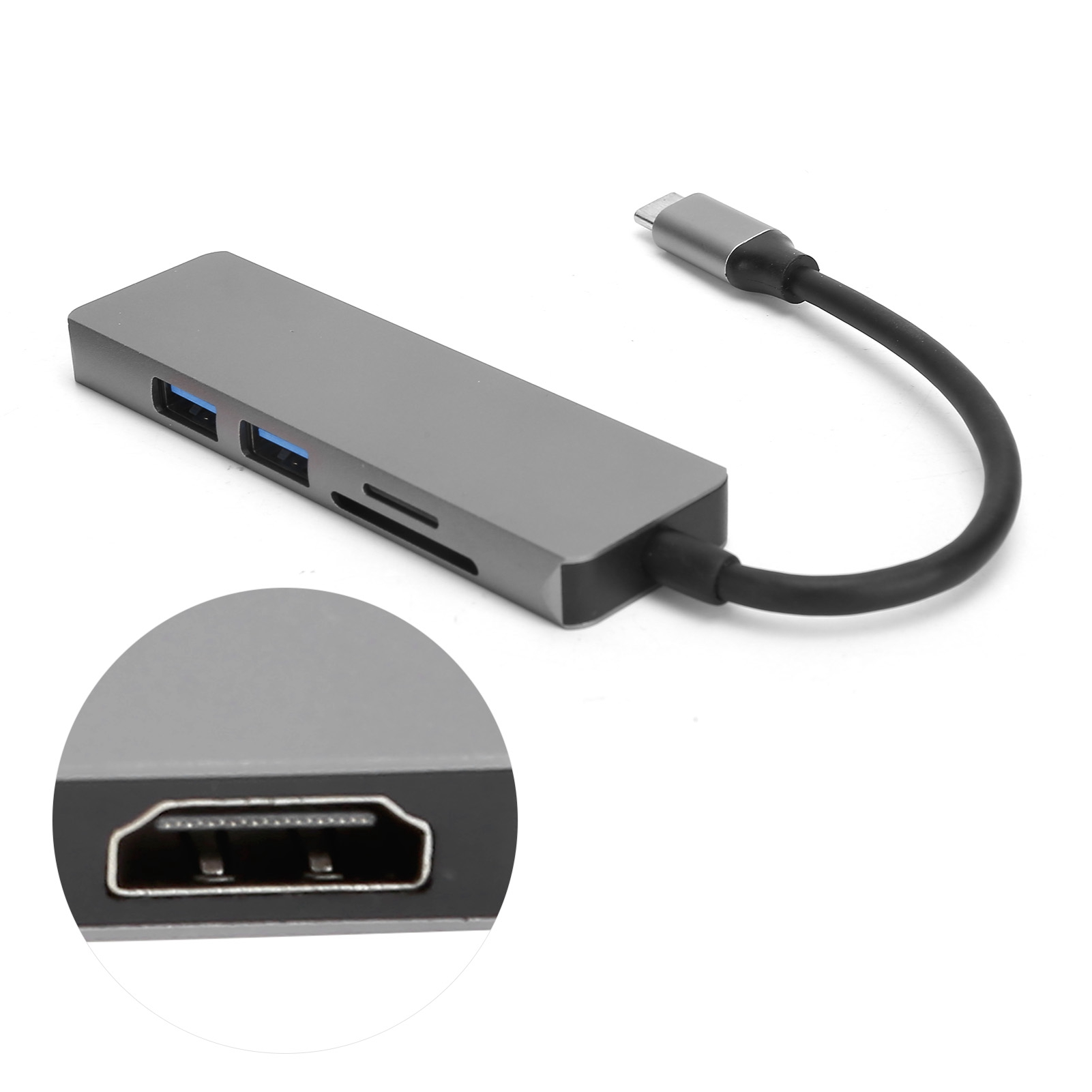 Grauer USB-C-Hub mit mehreren Anschlüssen. Eine Nahaufnahme zeigt einen HDMI-Anschluss.