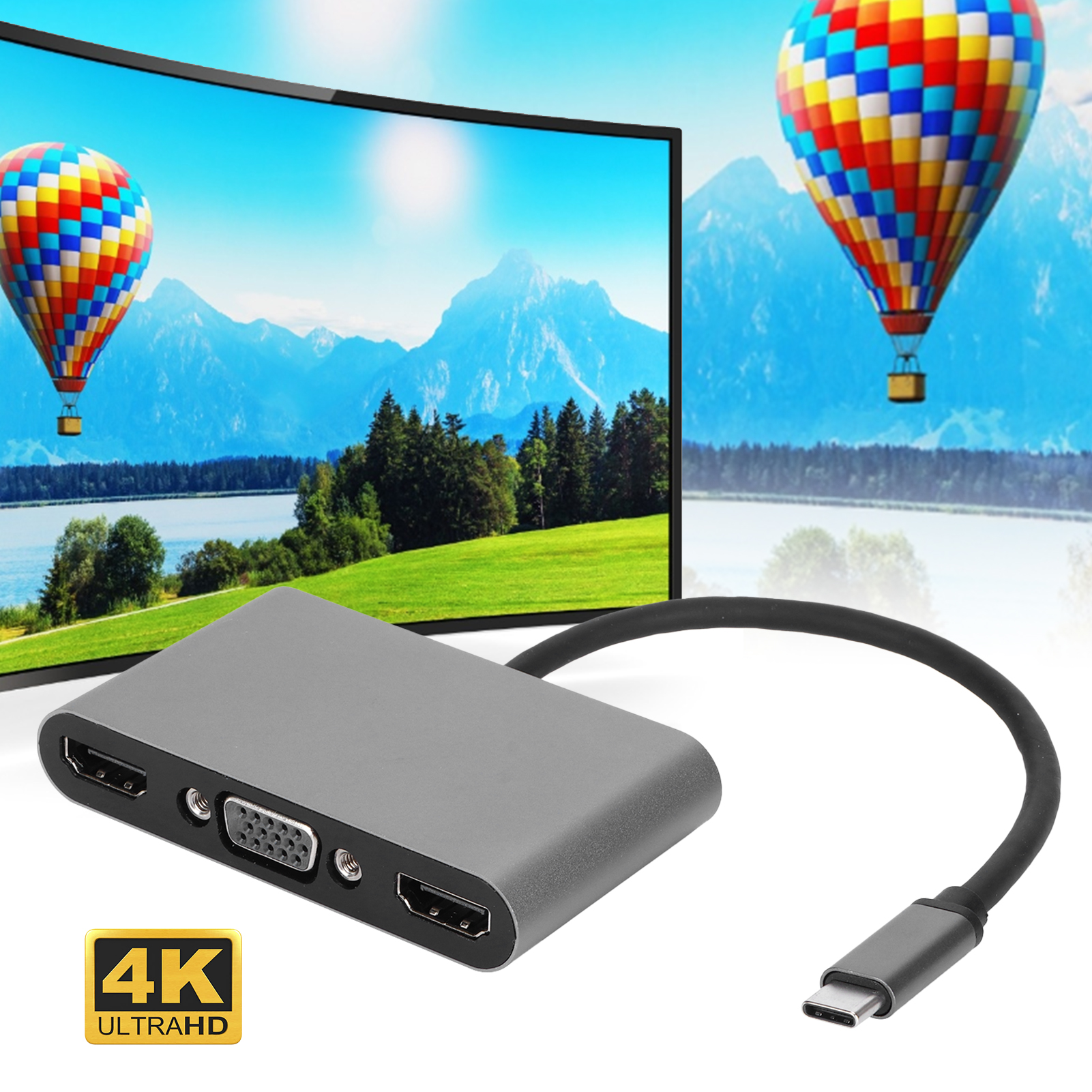 Grauer Adapter mit HDMI-, VGA- und USB-C-Anschlüssen. Im Hintergrund ein gebogener Bildschirm mit Heißluftballons.
