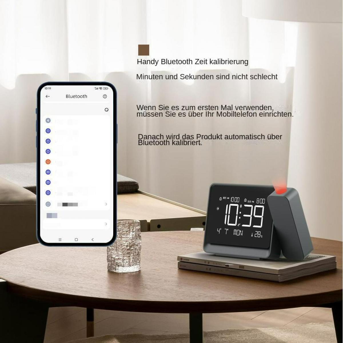 Ein Telefon zeigt Bluetooth-Einstellungen. Eine Uhr zeigt 10:39, mit einem separaten Modul, alles auf einem Tisch. Glas und Texte sind sichtbar.