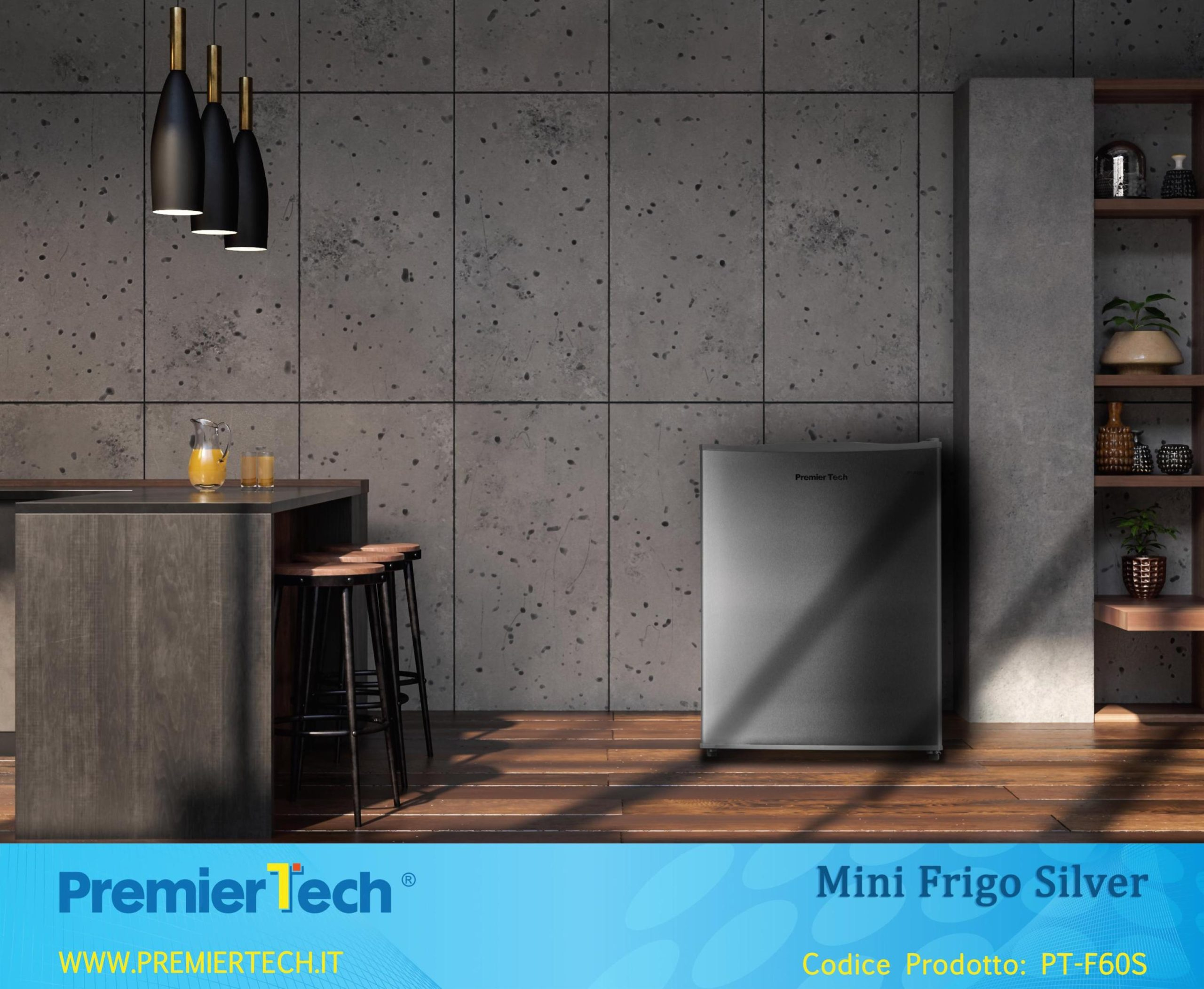 Un mini frigo argentato in una stanza. Un bancone con sgabelli e lampade a sospensione. Il pavimento è in legno.