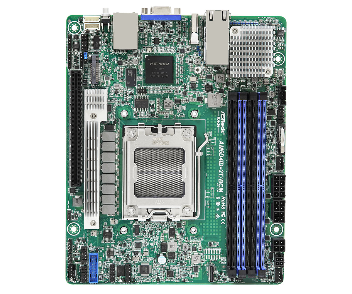 Una scheda madre verde ASRock AM5D4ID-2T/BCM con diversi componenti, tra cui un socket CPU, slot RAM e vari chip e connettori.