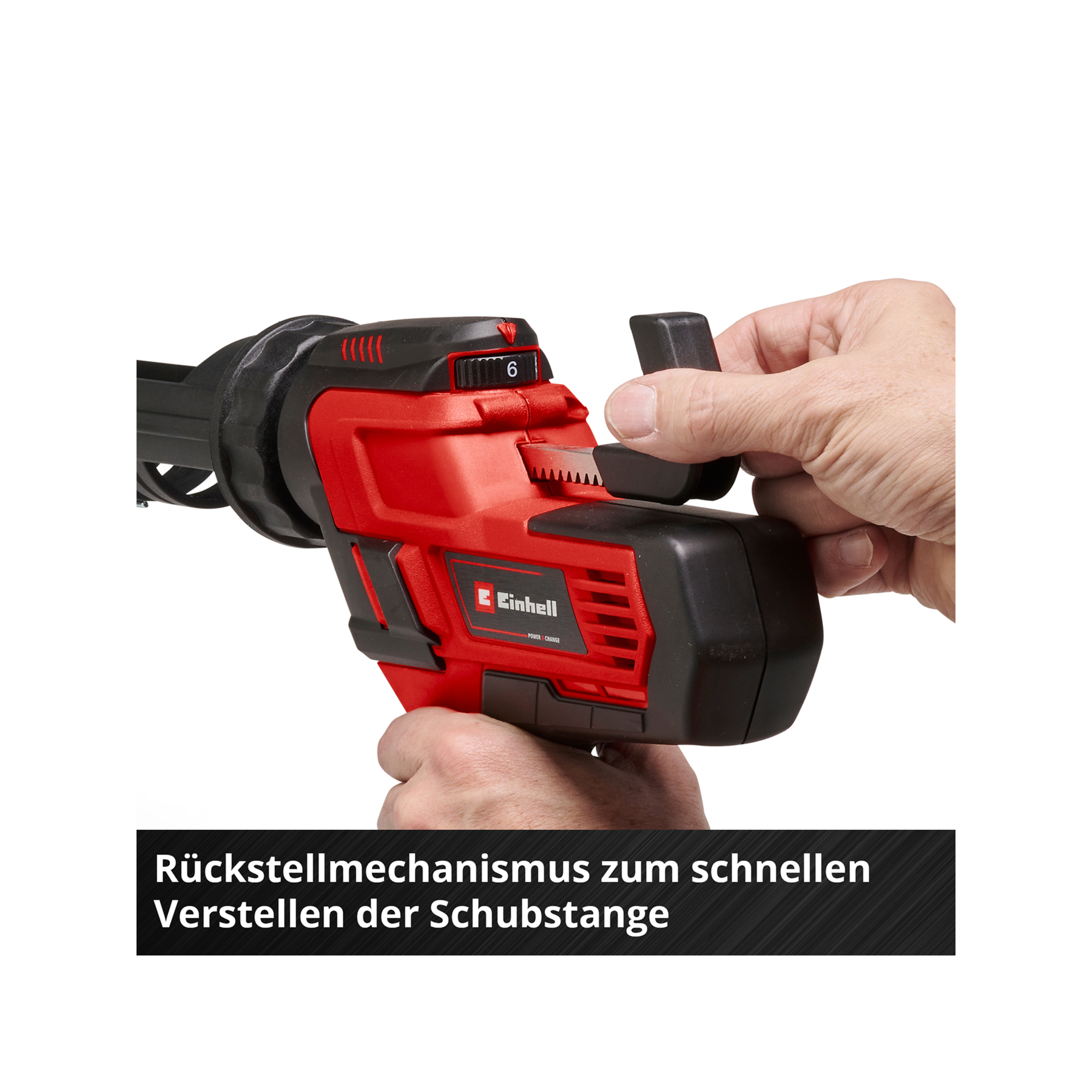 Hand holding a red and black power tool. The tool has a blade, a dial, and the Einhell logo.