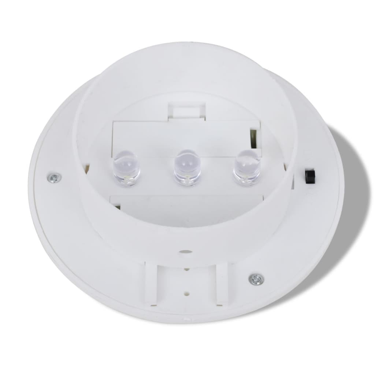Un apparecchio a LED bianco e circolare. Ha tre lampadine trasparenti. L'apparecchio è su una superficie bianca. C'è un'ombra.