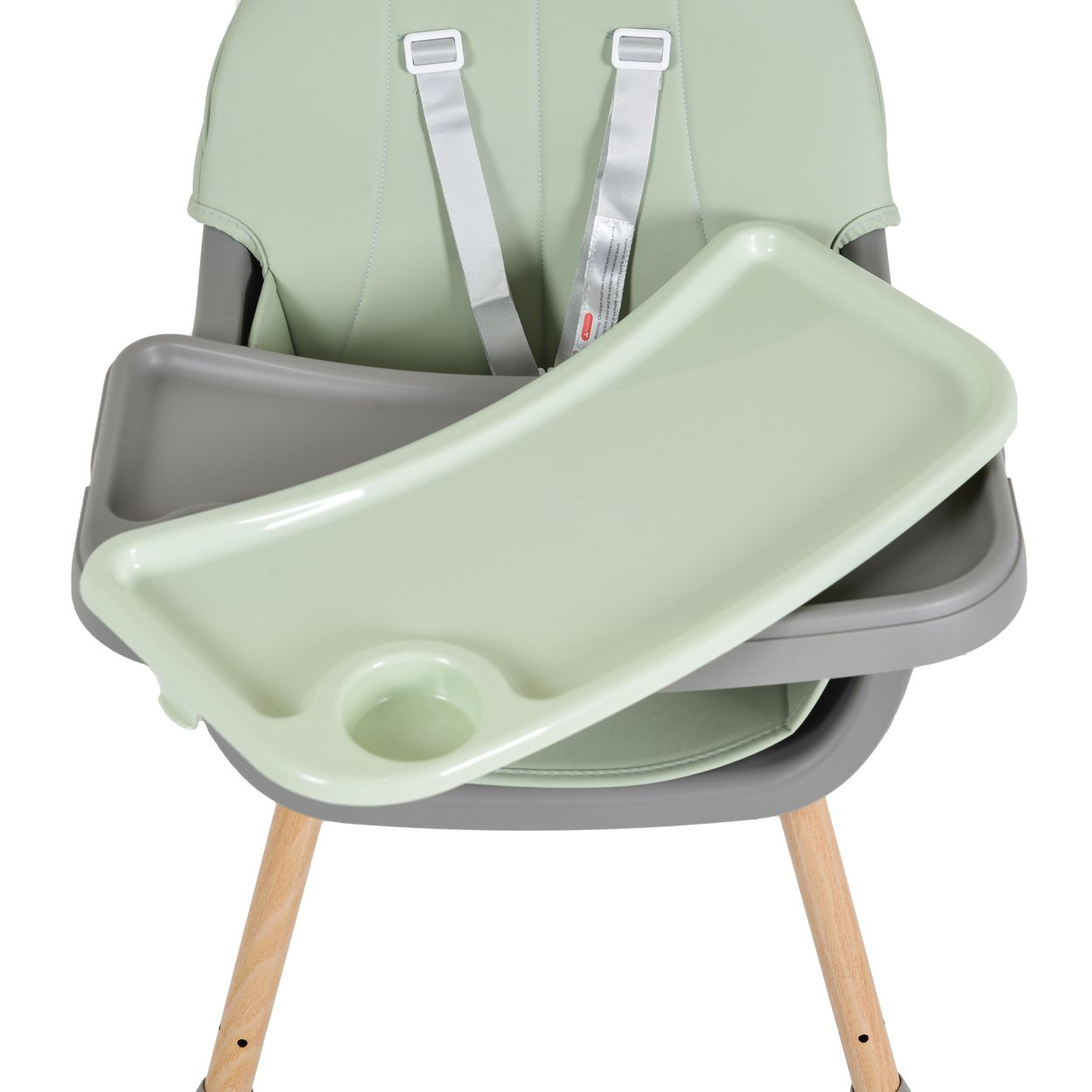 Ein hellgrüner Babyhochstuhl mit Tablett. Der Stuhl hat graue Details und Holzbeine. Auf dem Tablett befindet sich ein Becherhalter.