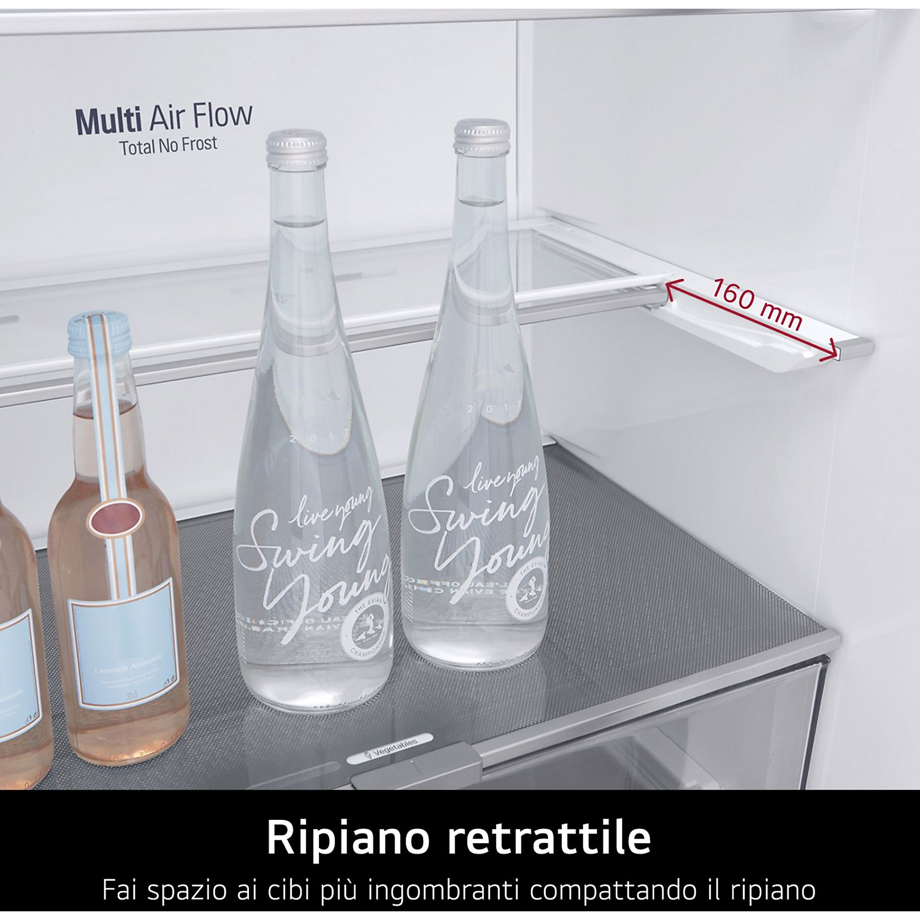 Im Kühlschrank stehen zwei Wasserflaschen und eine Flasche mit rosa Getränk auf einem Regal. Das Regal hat eine graue Oberfläche und einziehbar.