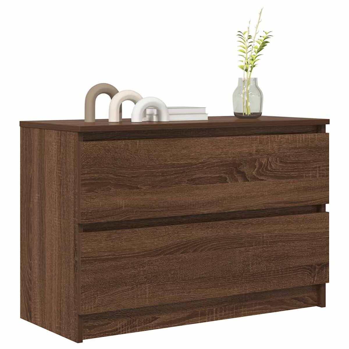 Holzkommode mit zwei Schubladen. Sie hat dekorative Objekte: Bögen, ein Buch und eine Vase mit Pflanzen.