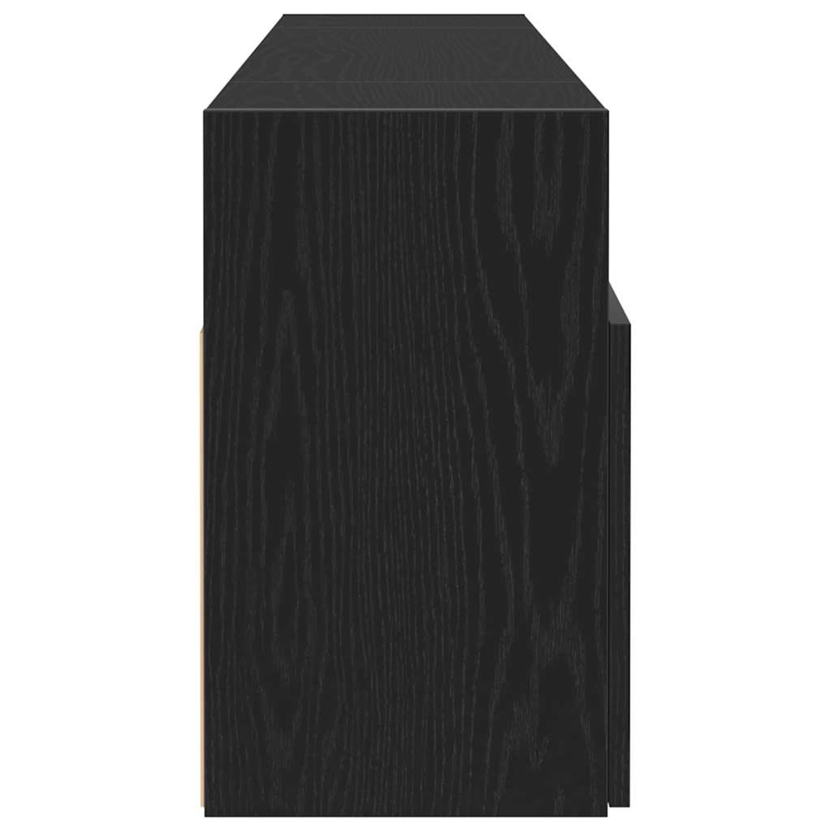 Ein schwarzer Holzschrank, Draufsicht. Die Holzmaserung ist sichtbar. Die Seiten sind ebenfalls schwarz. Ein hellbeiger Streifen befindet sich an der Seite.
