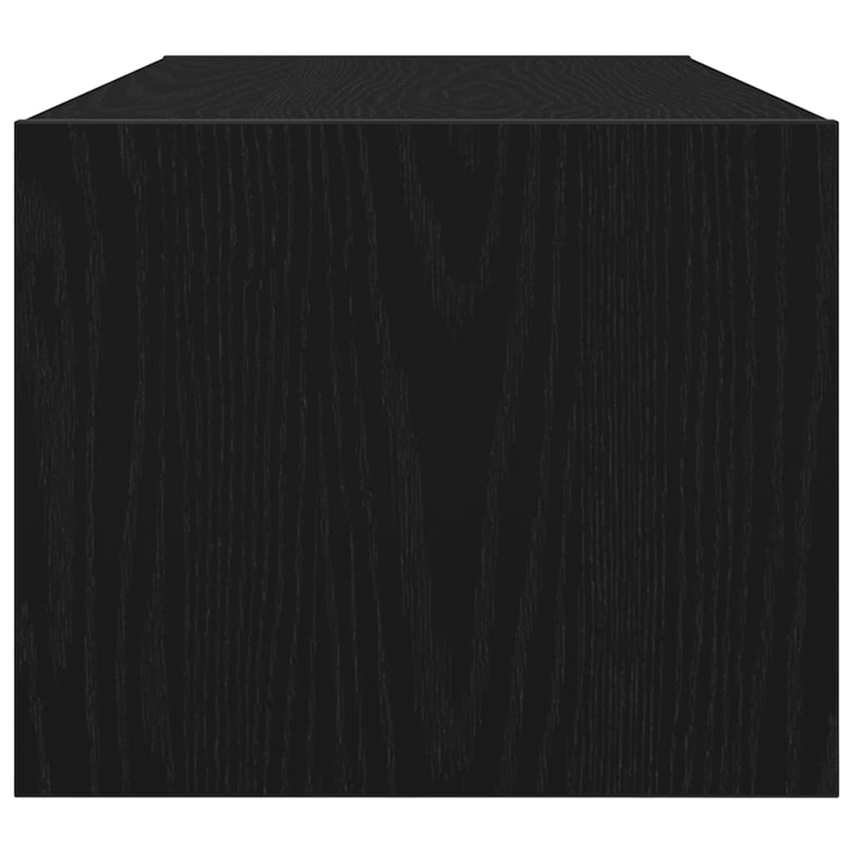 Ein schwarzer Holzwürfel, möglicherweise ein Schrank oder ein ähnliches Möbelstück, mit strukturierter Oberfläche und sichtbarer Maserung.