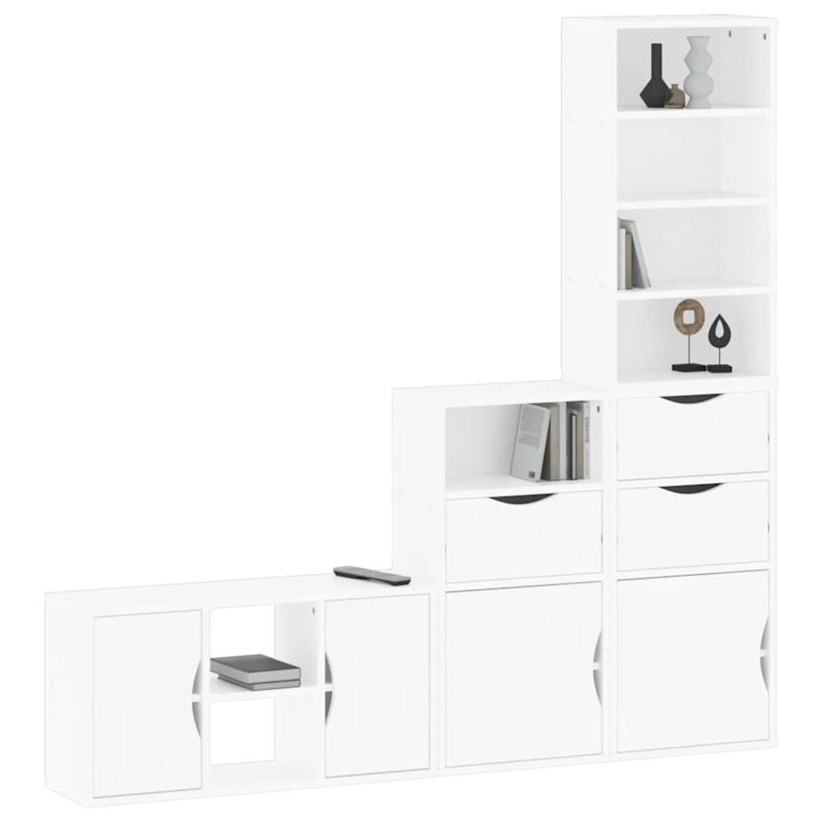 Ein weißes modulares Möbelset. Es umfasst Regale, Schränke und Schubladen. Dekorative Gegenstände und Bücher stehen auf den Regalen. Eine Fernbedienung ist vorhanden.