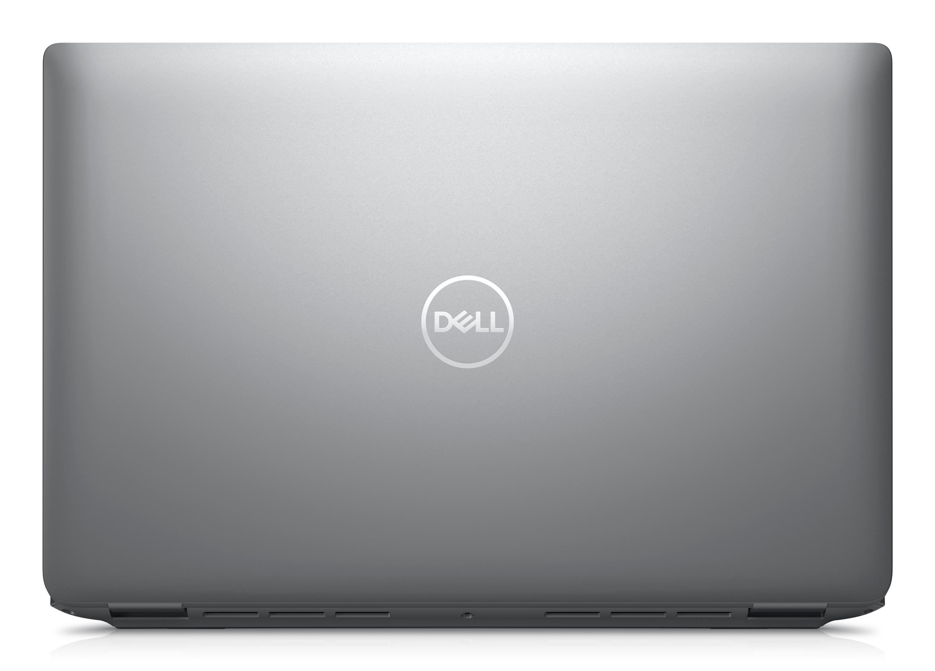 Zamknięty srebrny laptop z logo Dell pośrodku. Powierzchnia gładka i odblaskowa.