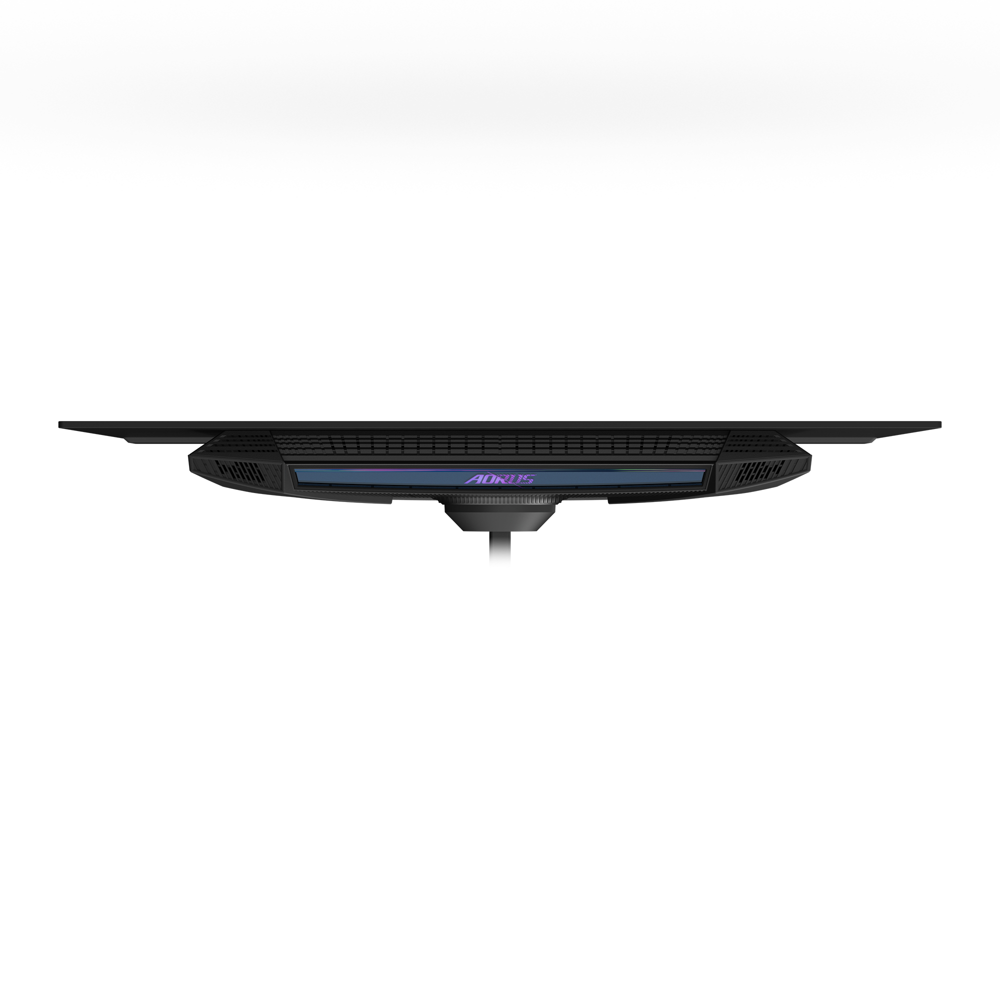 Czarny monitor z logo AORUS jest widoczny od dołu. Monitor znajduje się na białym tle.