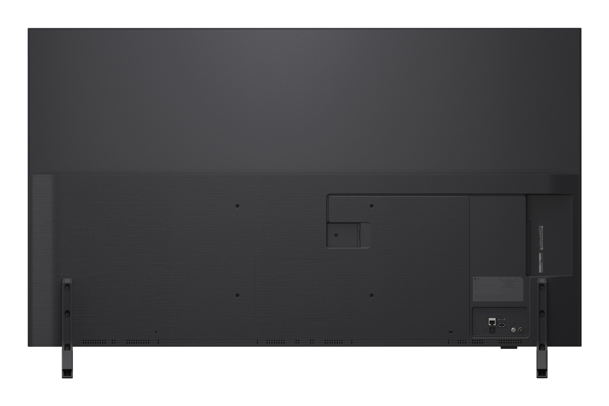 Tył czarnego telewizora. Posiada porty, stojak i teksturowaną powierzchnię. Widoczne logo marki i etykiety złącza.