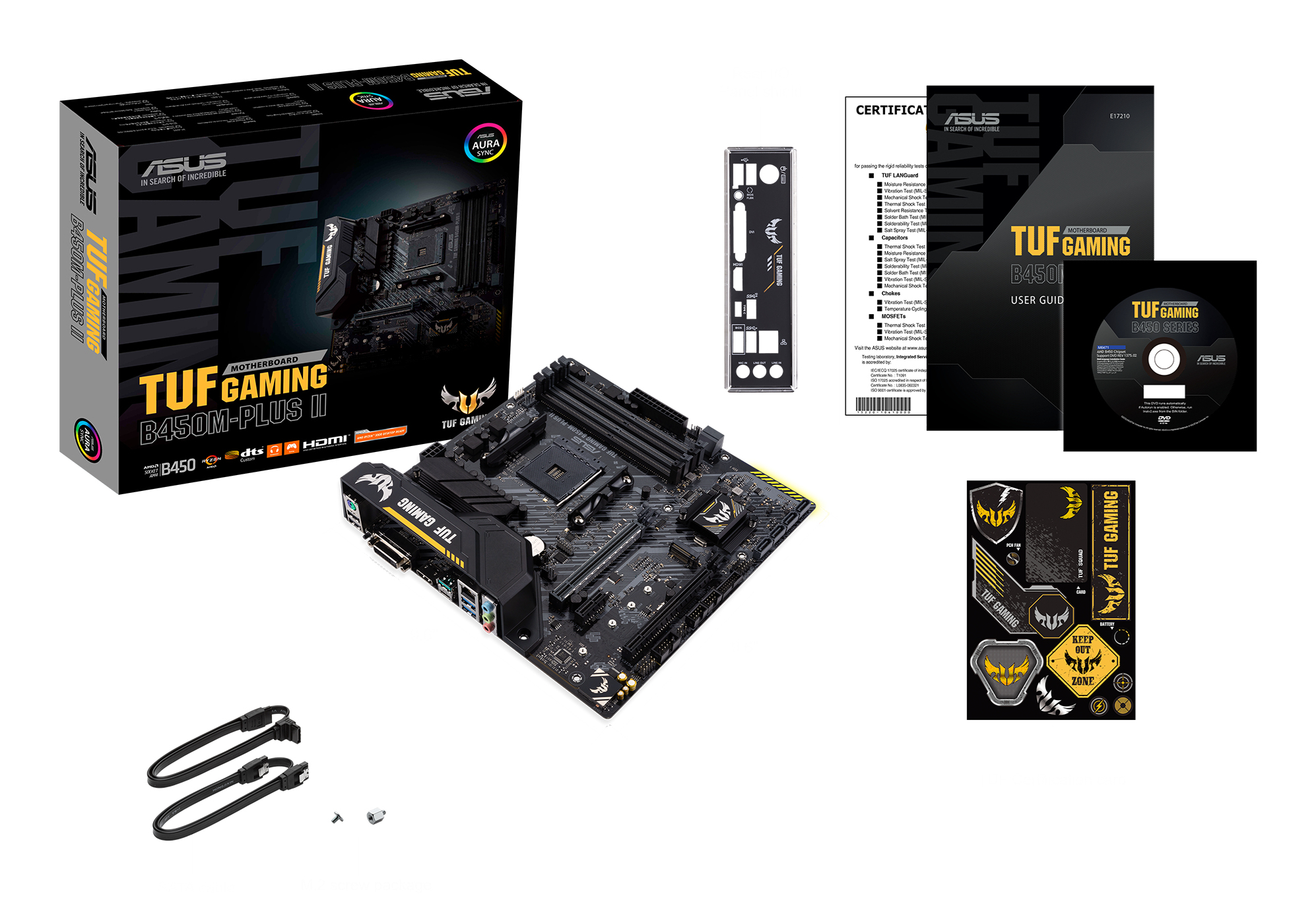 Una scheda madre, scatola e accessori su bianco. La scatola dice TUF GAMING B450M-PLUS II. Include guida utente e adesivi.