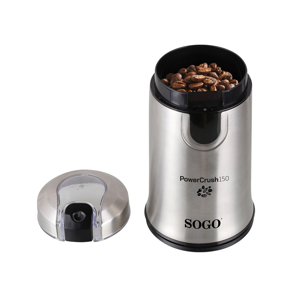 Un macinacaffè SOGO argentato con coperchio nero, pieno di chicchi di caffè. Il coperchio è a sinistra.