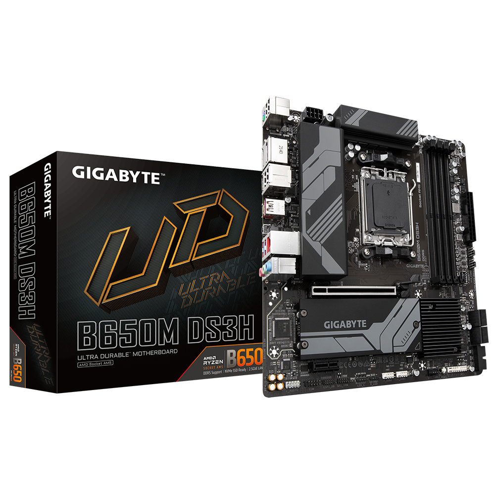 Una scheda madre Gigabyte B650M DS3H e la sua scatola. La scatola è nera con testo dorato. La scheda madre è nera e grigia.