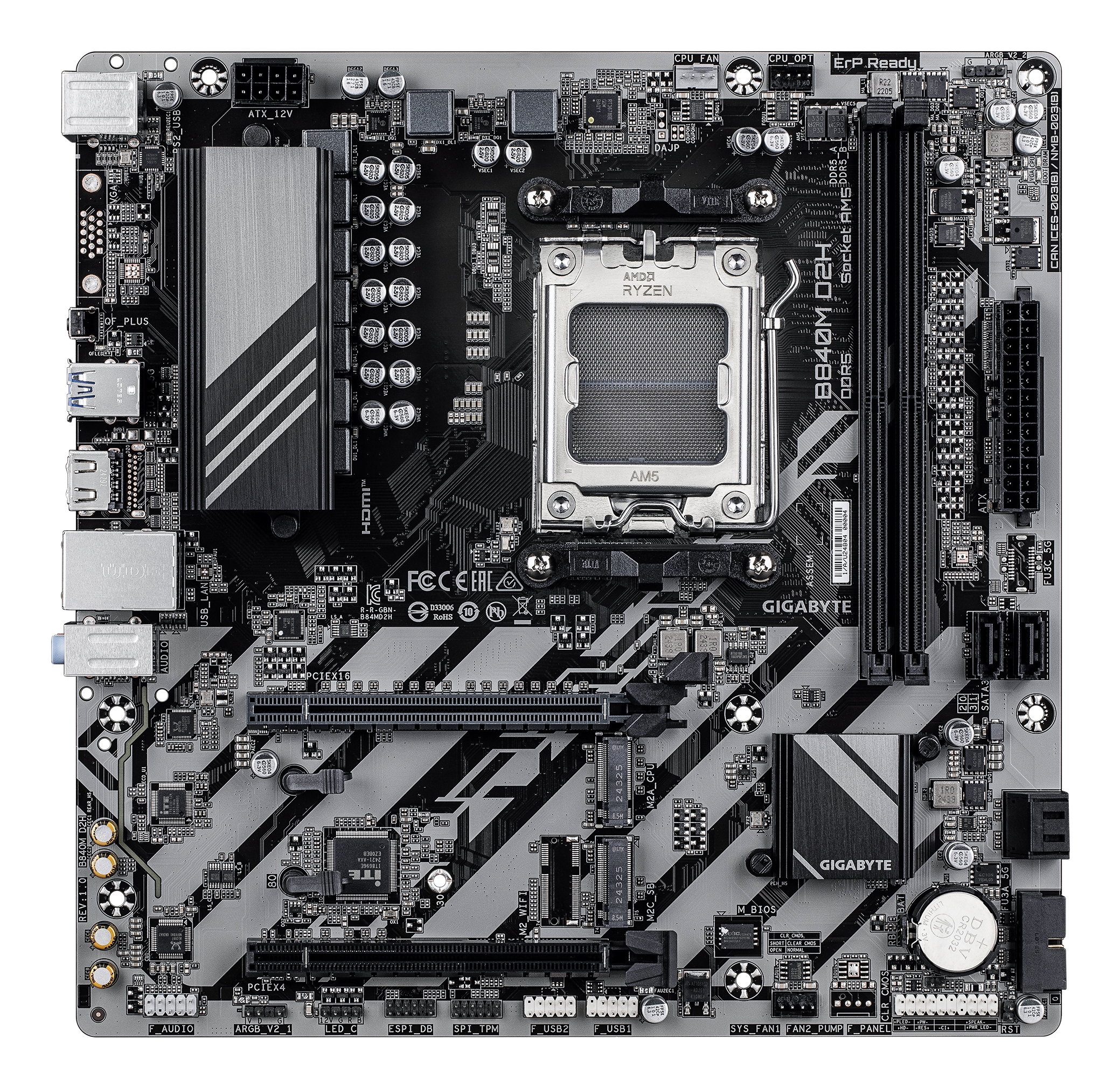 Czarna i szara płyta główna komputera z różnymi elementami, w tym gniazdami, układami i gniazdem CPU oraz logo AMD Ryzen.