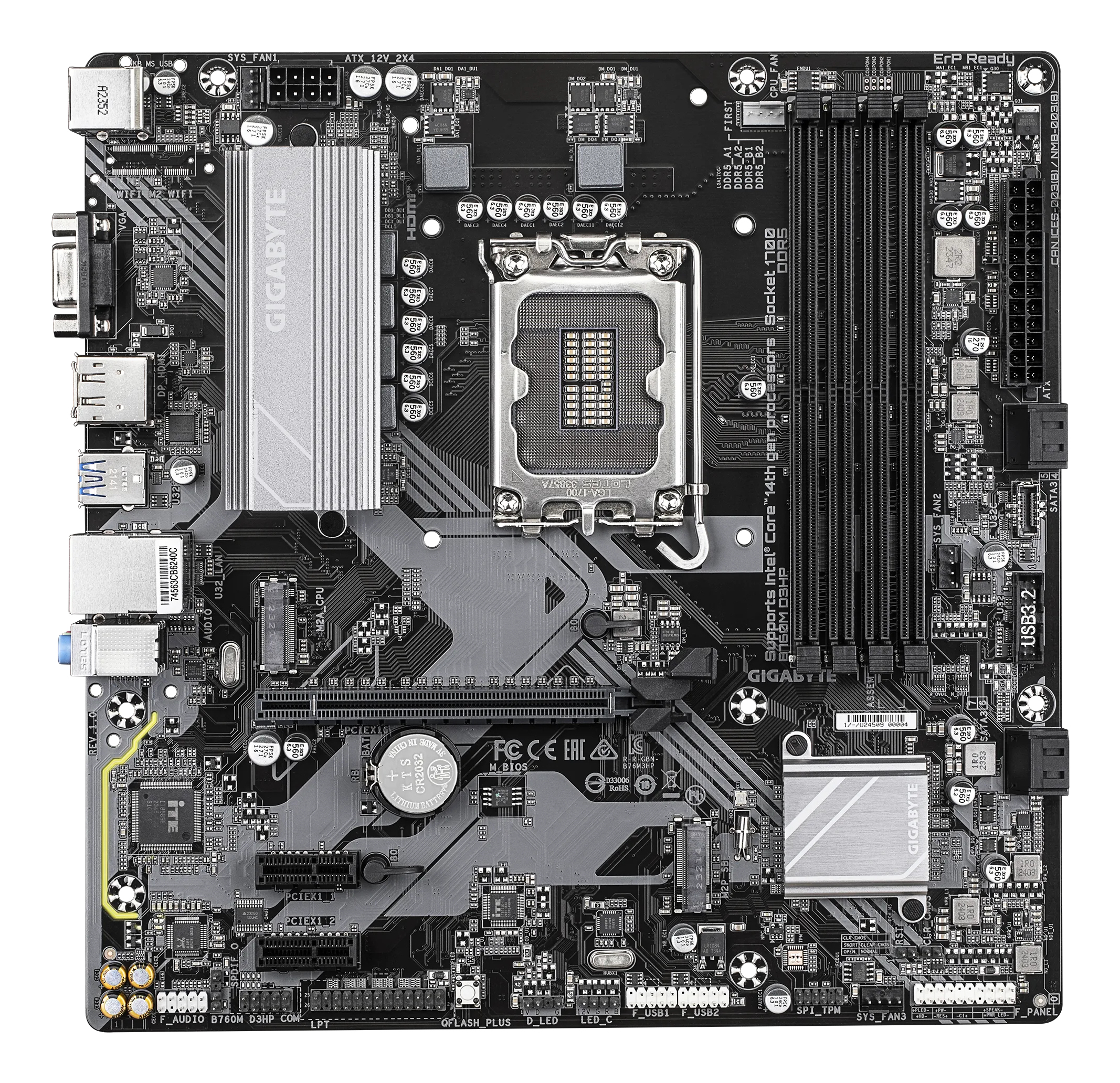 A black computer motherboard with silver heat sinks and various ports and slots, Gigabyte brand is visible.