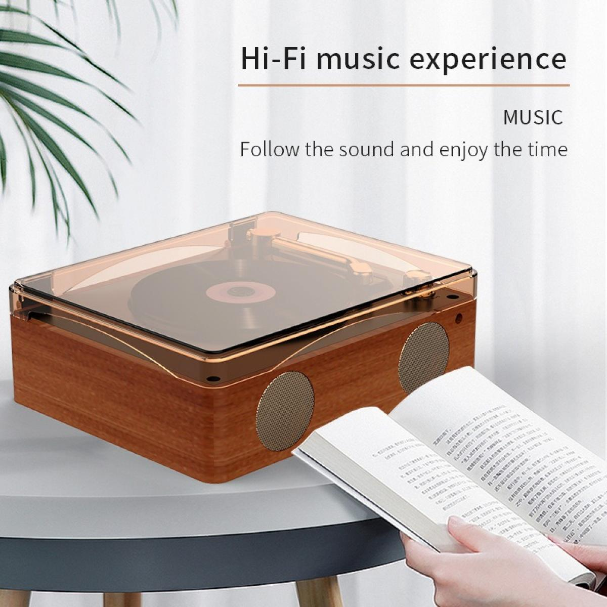 Ein hölzerner Plattenspieler mit transparentem Deckel. Davor ist ein Buch aufgeschlagen. Der Text 'Hi-Fi music experience' ist sichtbar.