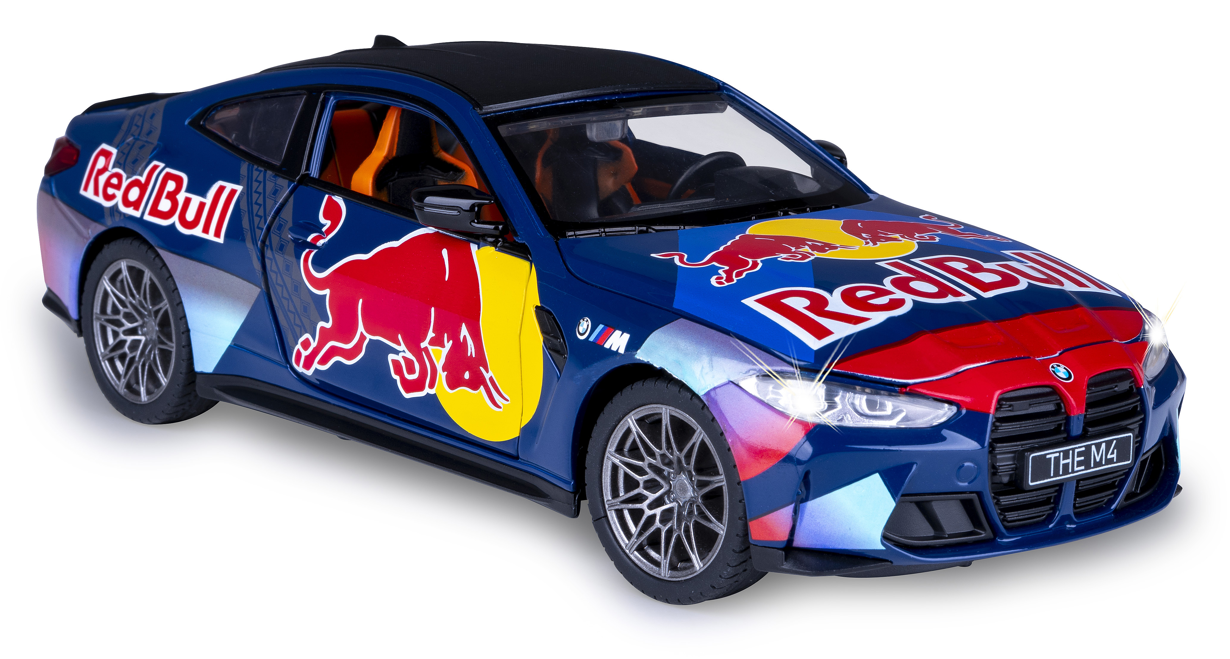 Ein blau-rotes Red Bull BMW M4 Spielzeugauto. Es hat Red Bull Logos und ein schwarzes Dach. Die Scheinwerfer sind an, und es steht auf einer weißen Oberfläche.