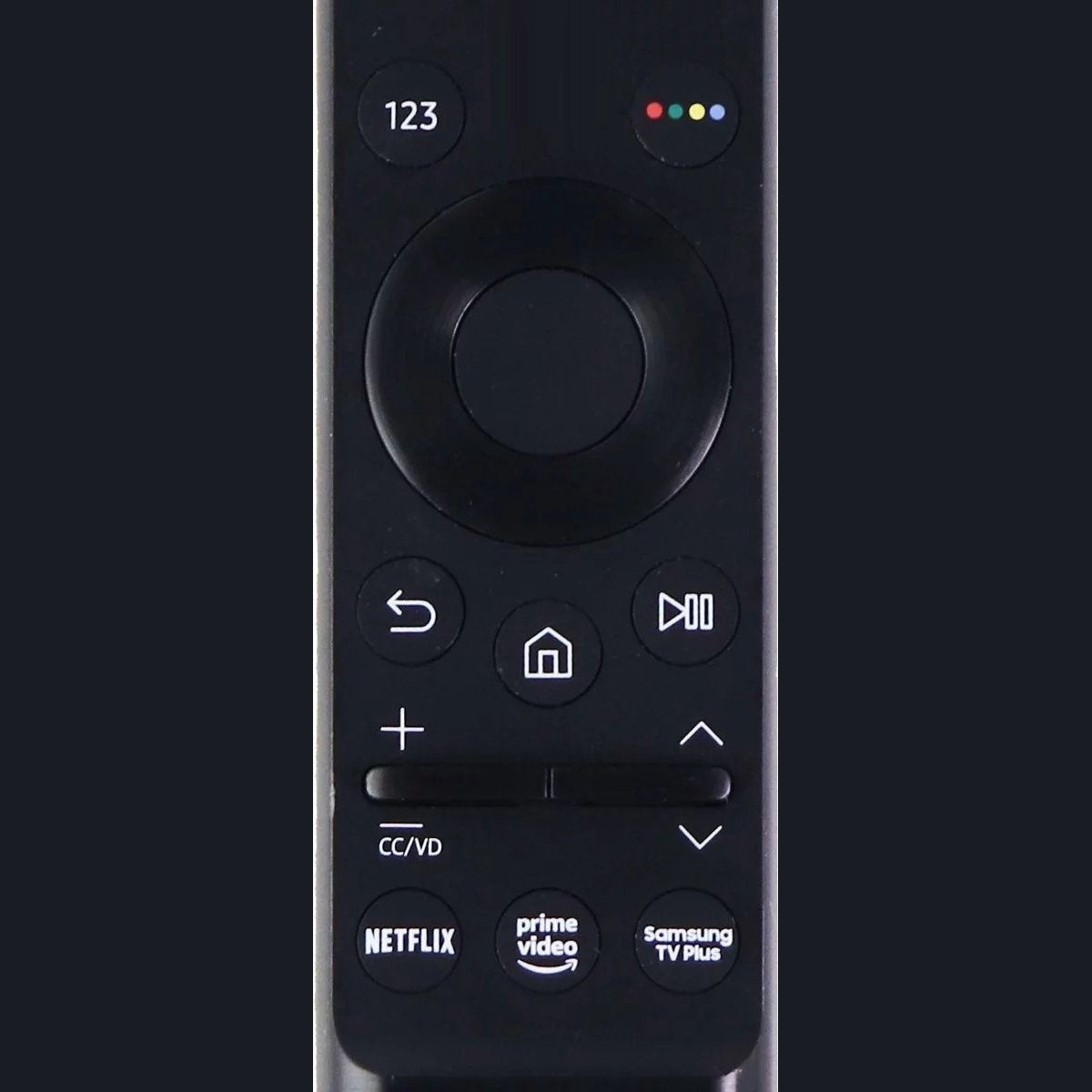 Close-up of a black Samsung TV remote. It has various buttons like Netflix, Prime Video, and Samsung TV Plus, with a circular central control.