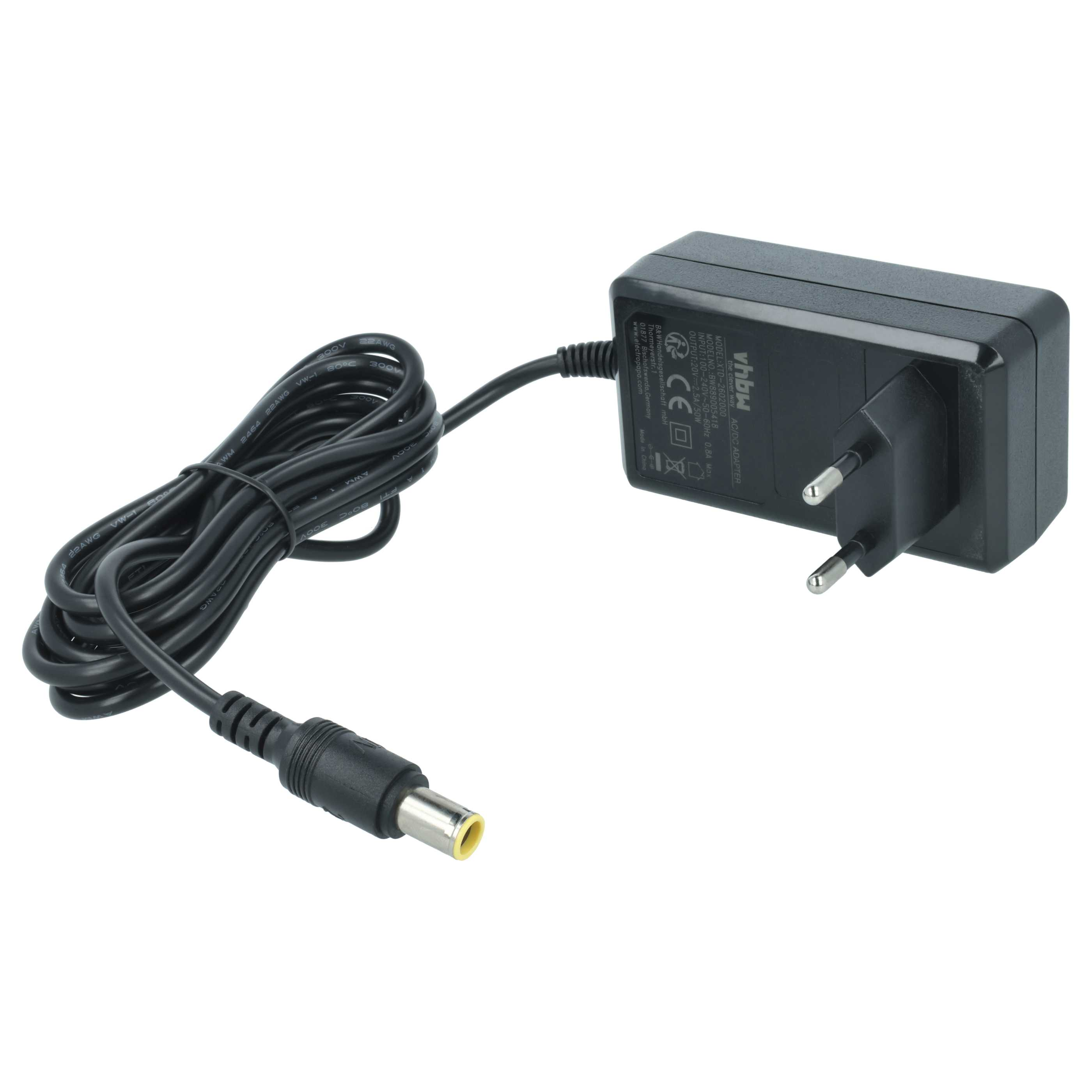 Ein schwarzes AC/DC-Netzteil mit schwarzem Kabel und gelbem Stecker, auf weißem Hintergrund.