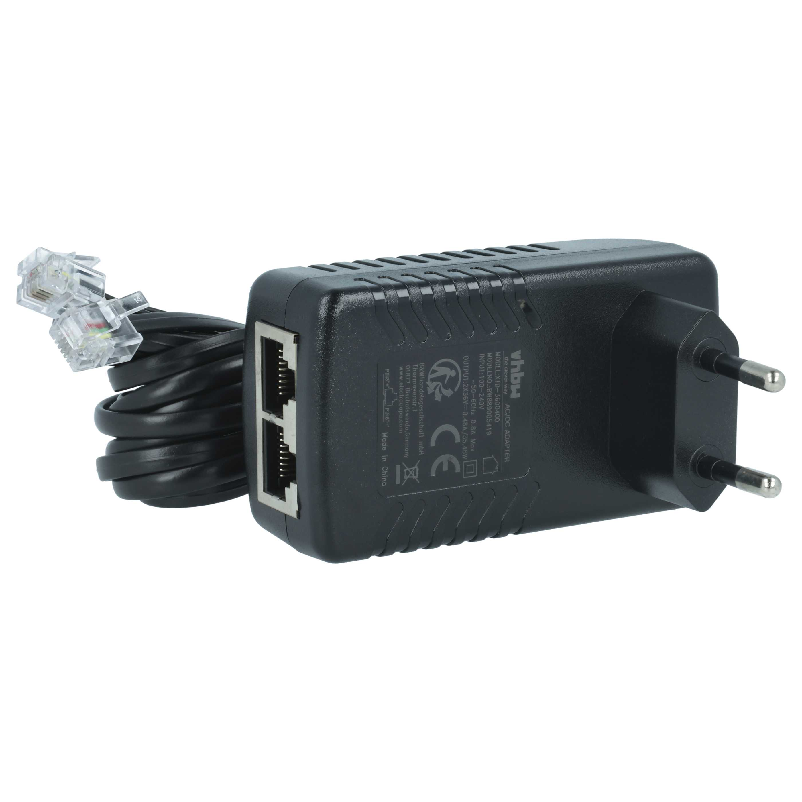 Schwarzer AC/DC-Adapter mit zwei RJ45-Anschlüssen, einem Stecker und einem schwarzen Kabel mit RJ45-Anschlüssen.