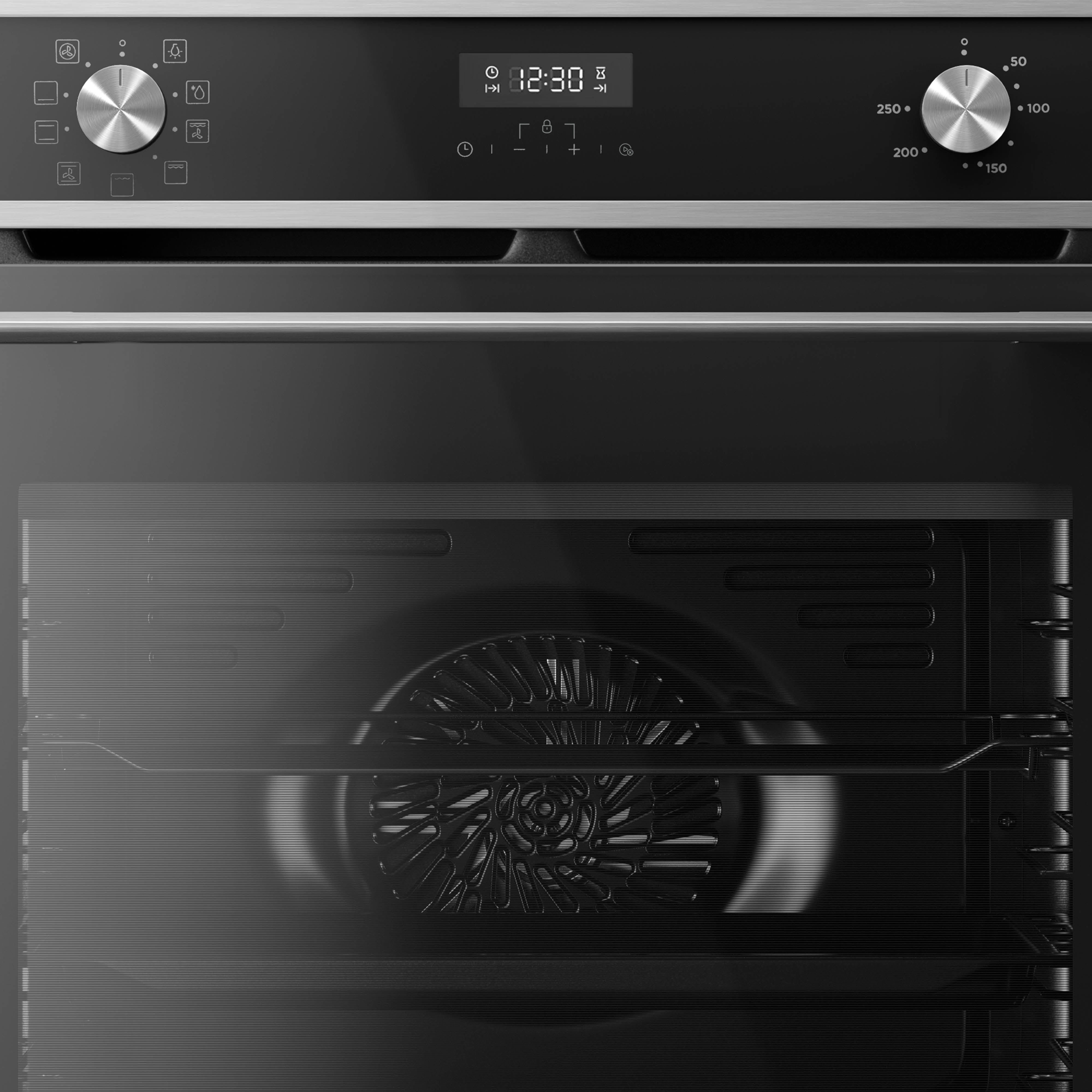 Oven control panel showing dials, digital clock, and temperature settings. The oven door is visible below.
