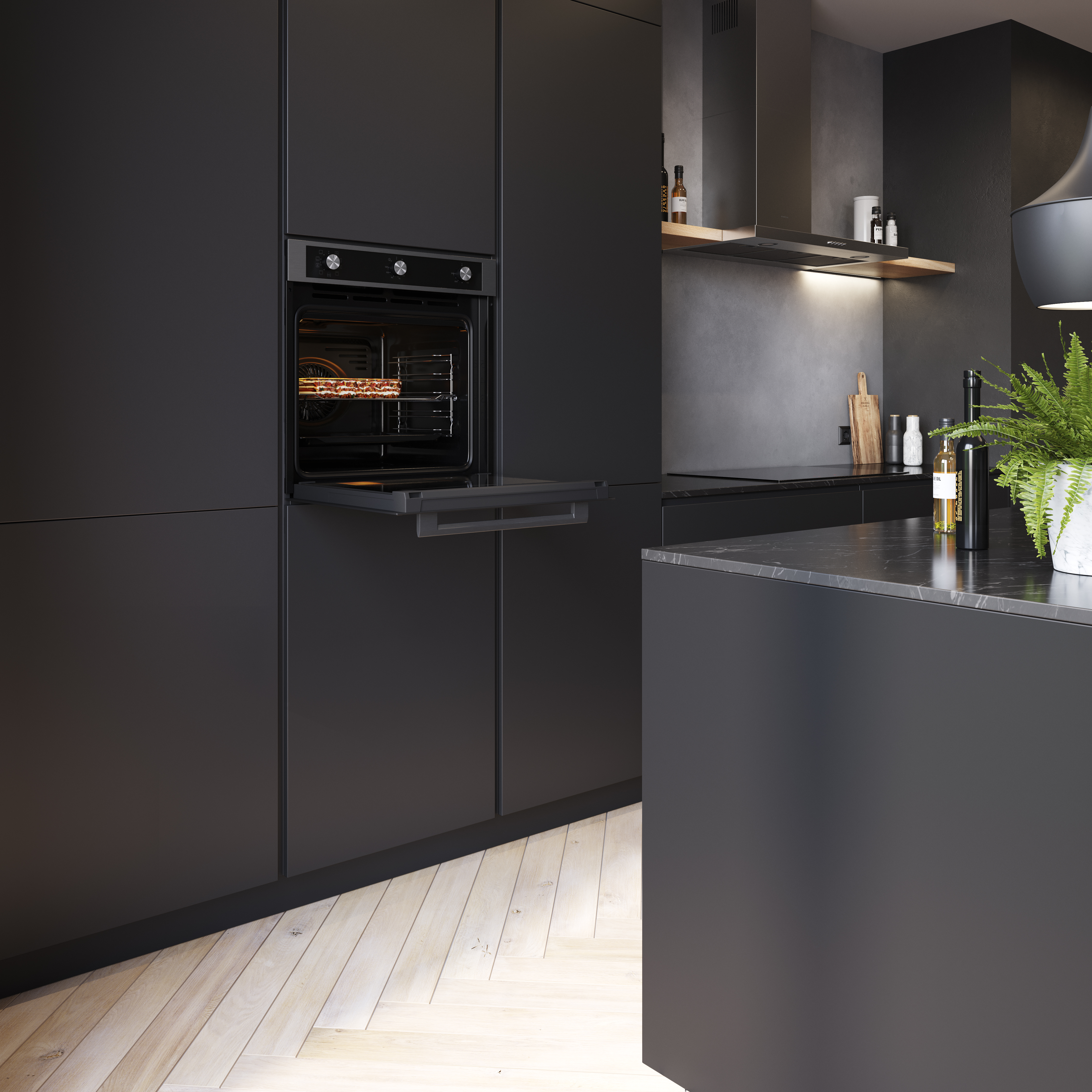 A modern kitchen with black cabinets, an open oven with food inside, and a countertop with a plant.