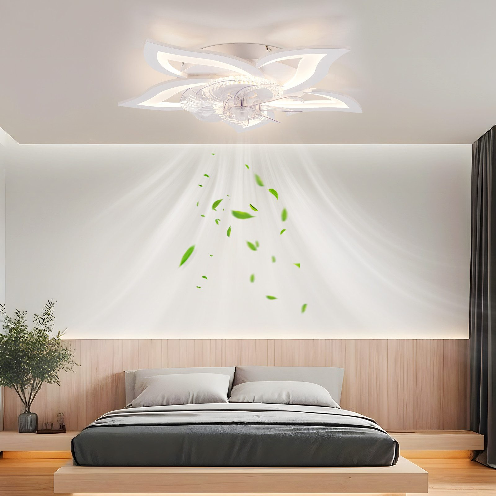 Una camera da letto con un ventilatore a soffitto a forma di fiore. Cadono foglie verdi. Letto e parete in legno.