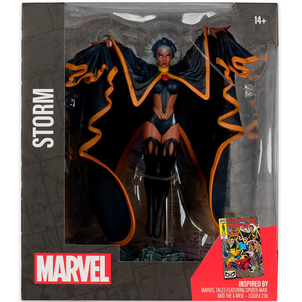 Eine Storm-Figur in einer Marvel-Box. Die Figur hat einen schwarzen und orangenen Umhang. Die Box zeigt das Marvel-Logo und den Text "Storm".