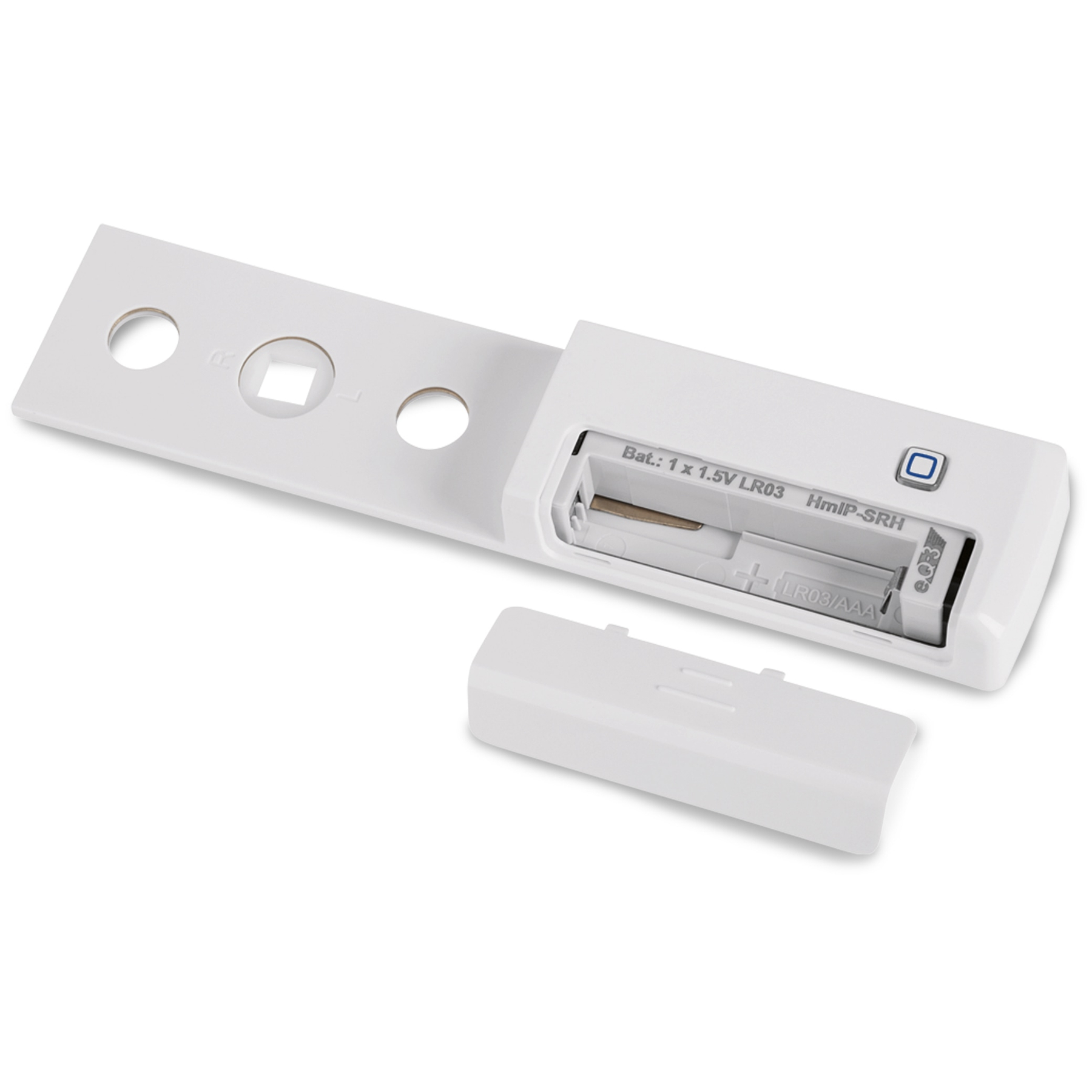 Białe urządzenie elektroniczne z otwartą komorą baterii, zdjętą pokrywą. Zawiera baterię i ma przycisk. Otwory z boku.