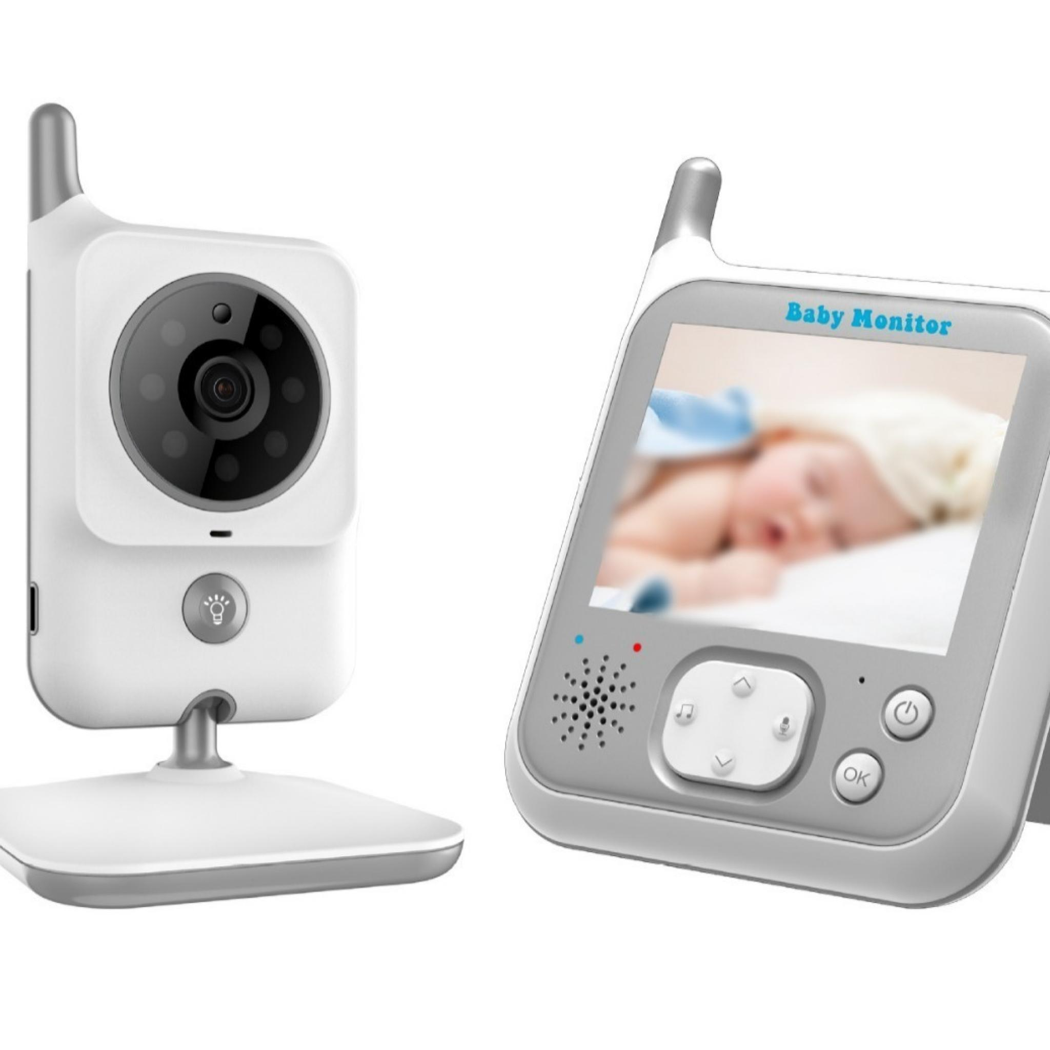 Ein Babyphone-Set. Es hat eine Kamera und einen Monitor, der ein verschwommenes Bild eines schlafenden Babys zeigt.