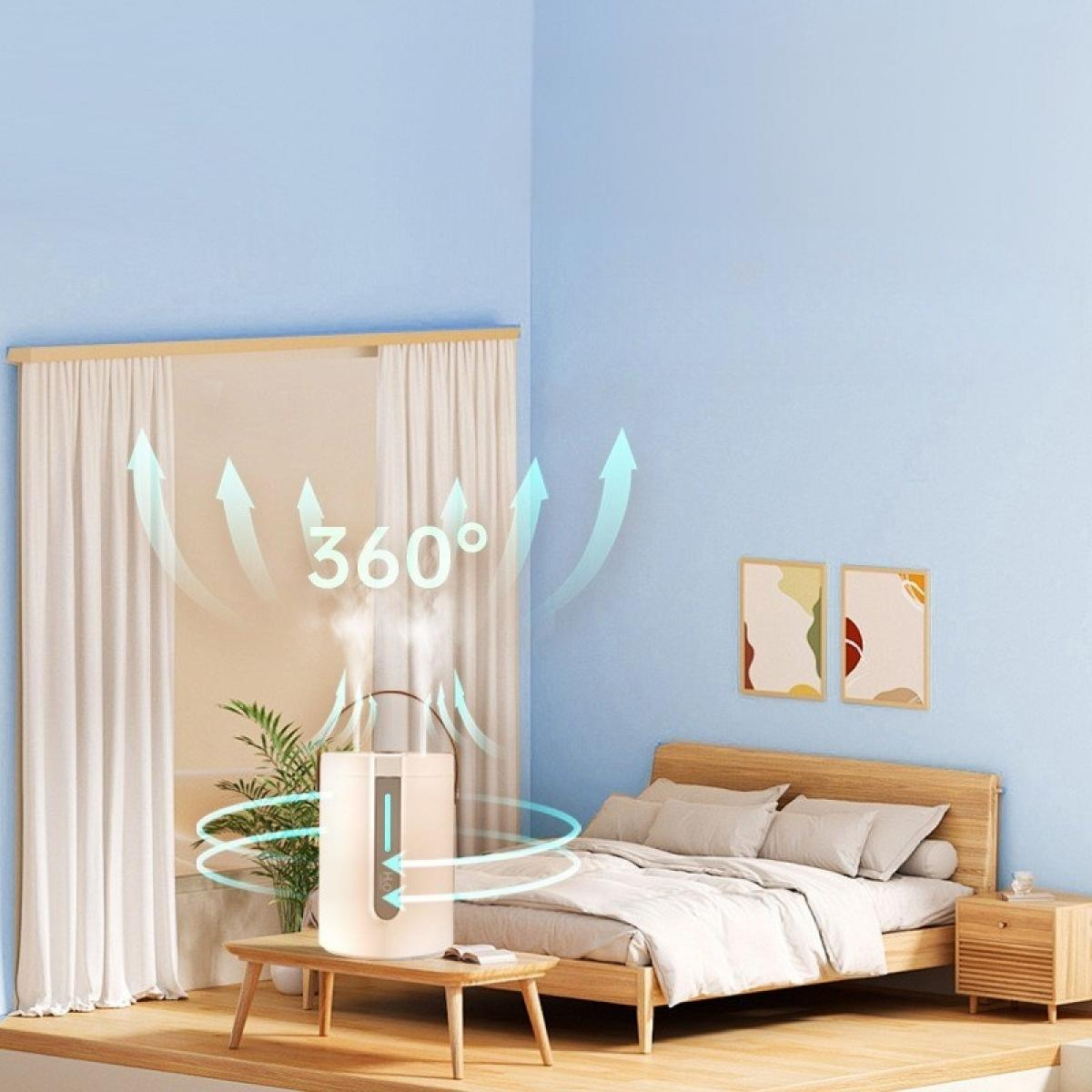 Ein Luftbefeuchter in einem Schlafzimmer. Weiße Vorhänge, ein Bett und abstrakte Kunst sind sichtbar. Blaue Wände schaffen eine ruhige Atmosphäre.