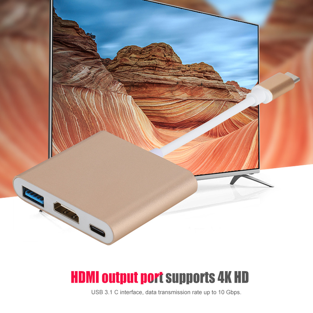 Ein goldener Adapter mit USB-, HDMI- und USB-C-Anschlüssen ist mit einem Fernseher verbunden, der eine Wüstenlandschaft zeigt. Text: HDMI-Ausgang unterstützt 4K HD.