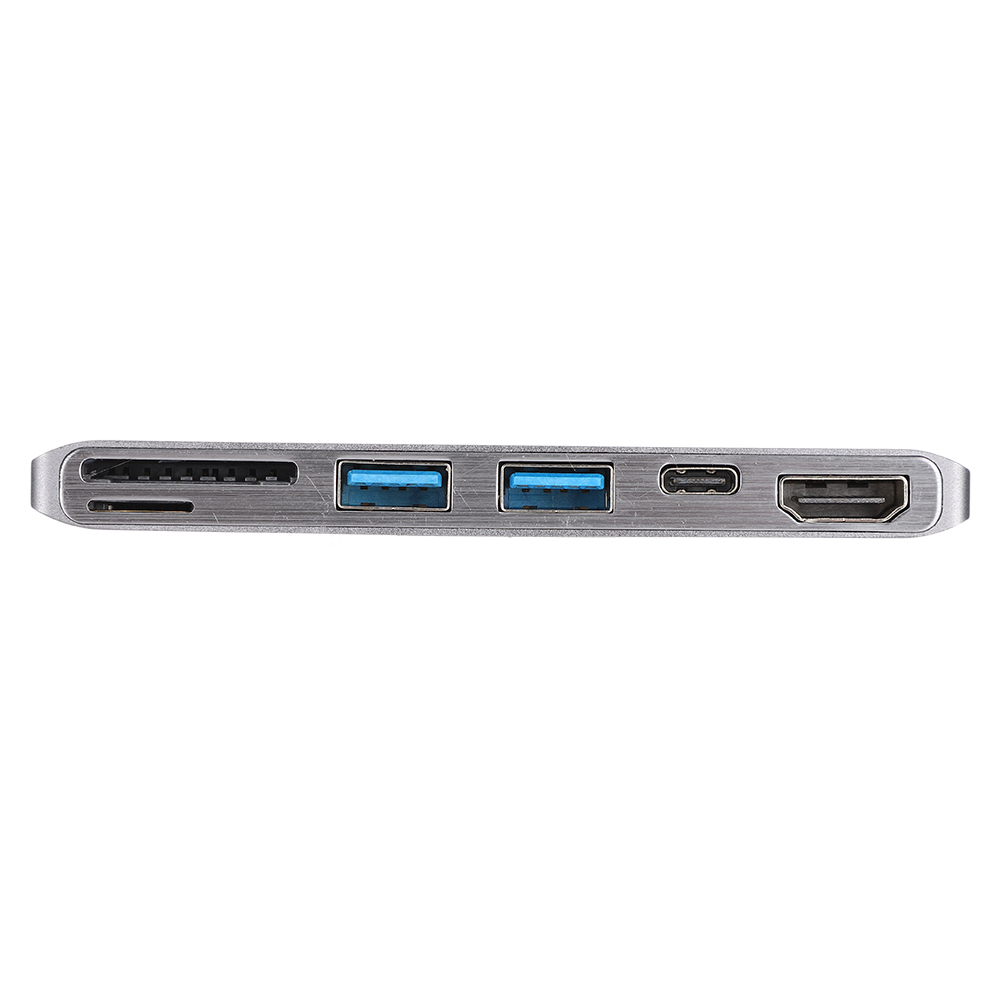 Ein silberner USB-Hub mit mehreren Anschlüssen: SD-Kartenleser, USB-Anschlüsse und HDMI-Anschluss. Blaue Details an den USB-Anschlüssen.