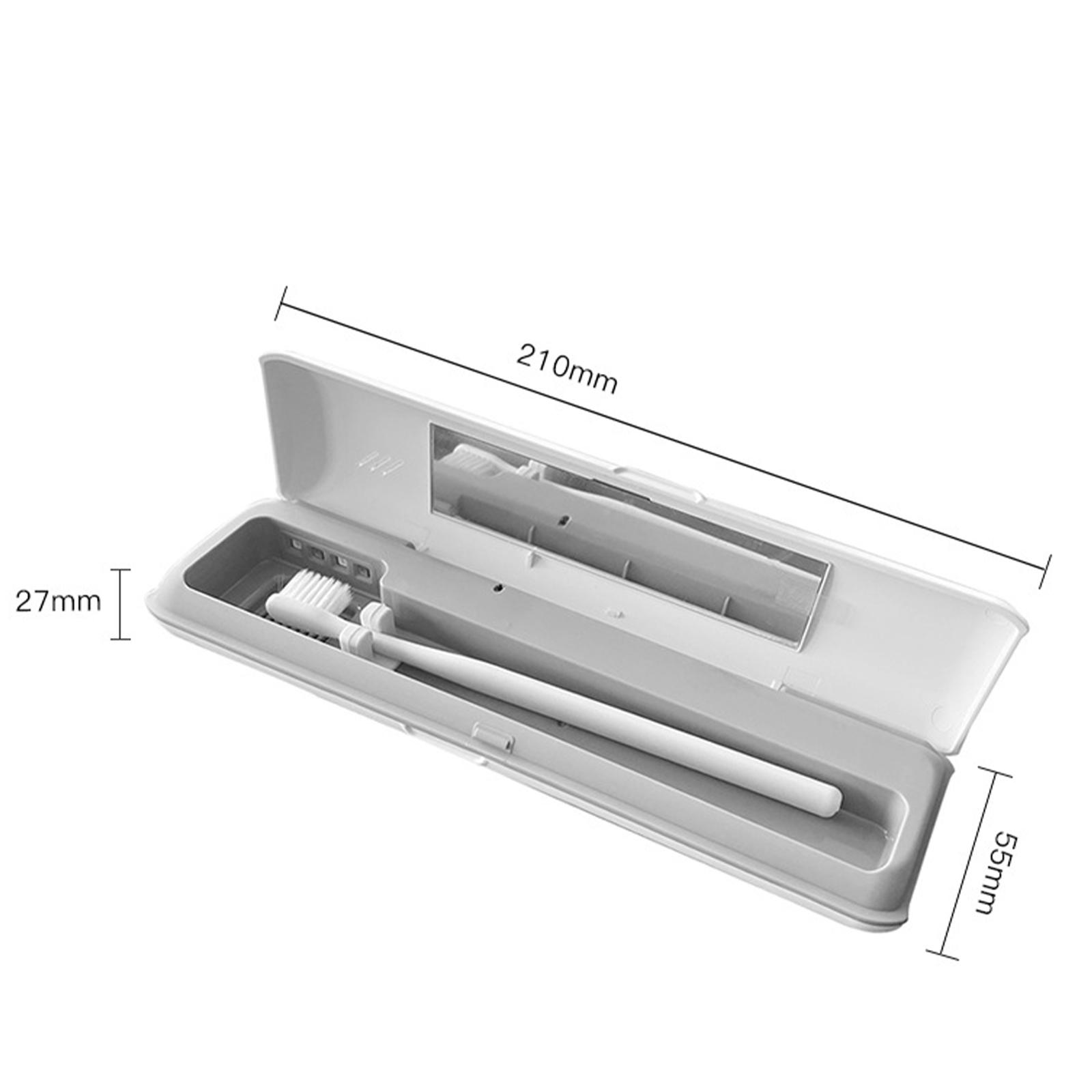 Ein offenes weißes Zahnbürstenetui mit einer weißen Zahnbürste. Abmessungen: 210 mm lang, 55 mm breit und 27 mm hoch.